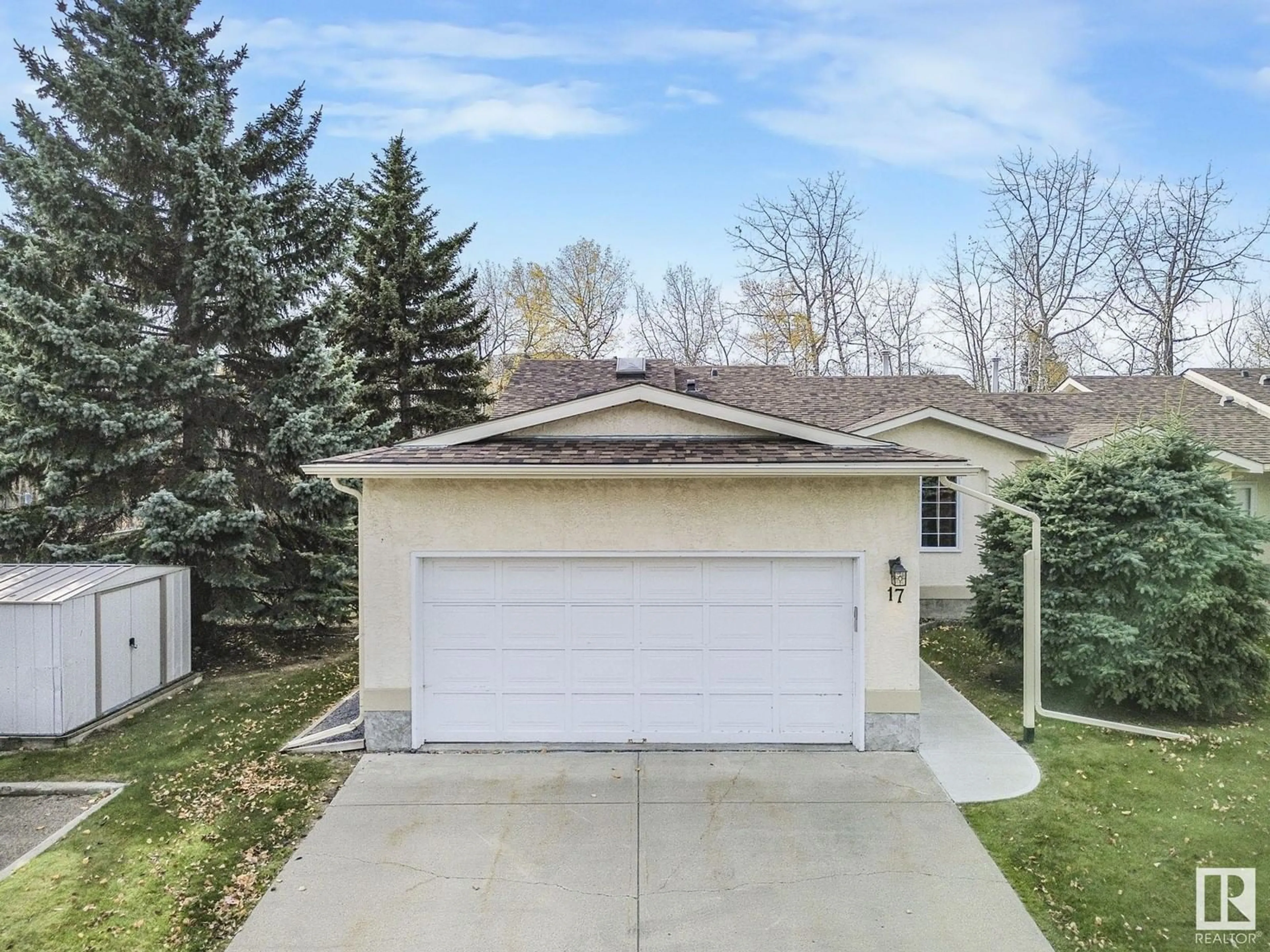 Frontside or backside of a home, the fenced backyard for #17 10 GRANGE DR, St. Albert Alberta T8N5Z2