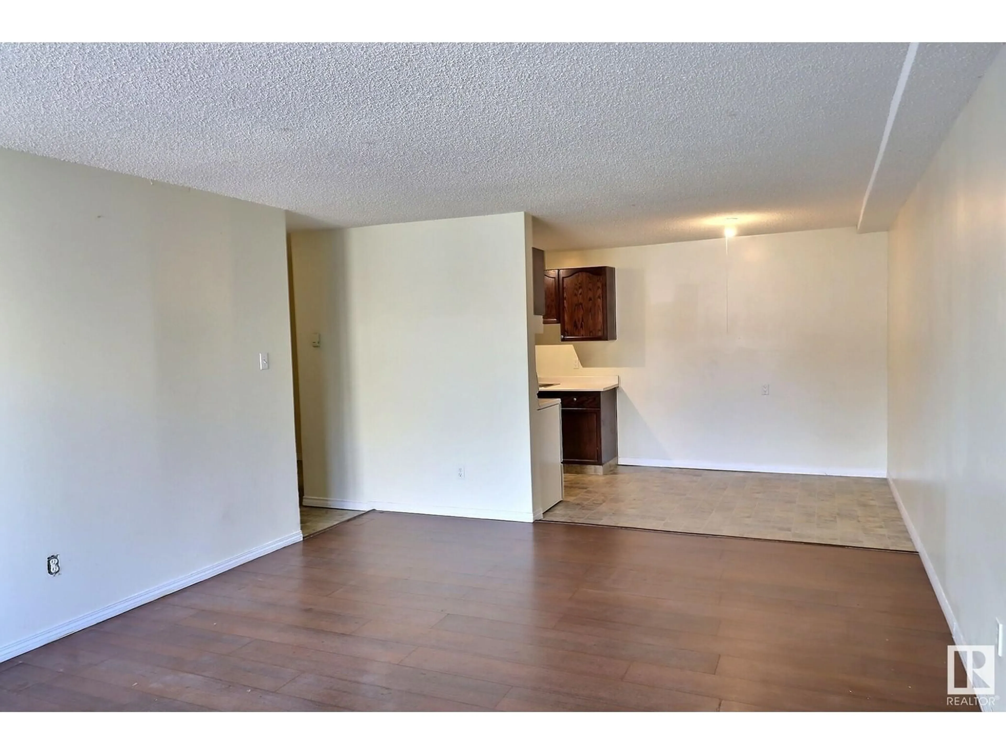 A pic of a room, wood floors for 103 10615 110 ST NW, Edmonton Alberta T5H3C7