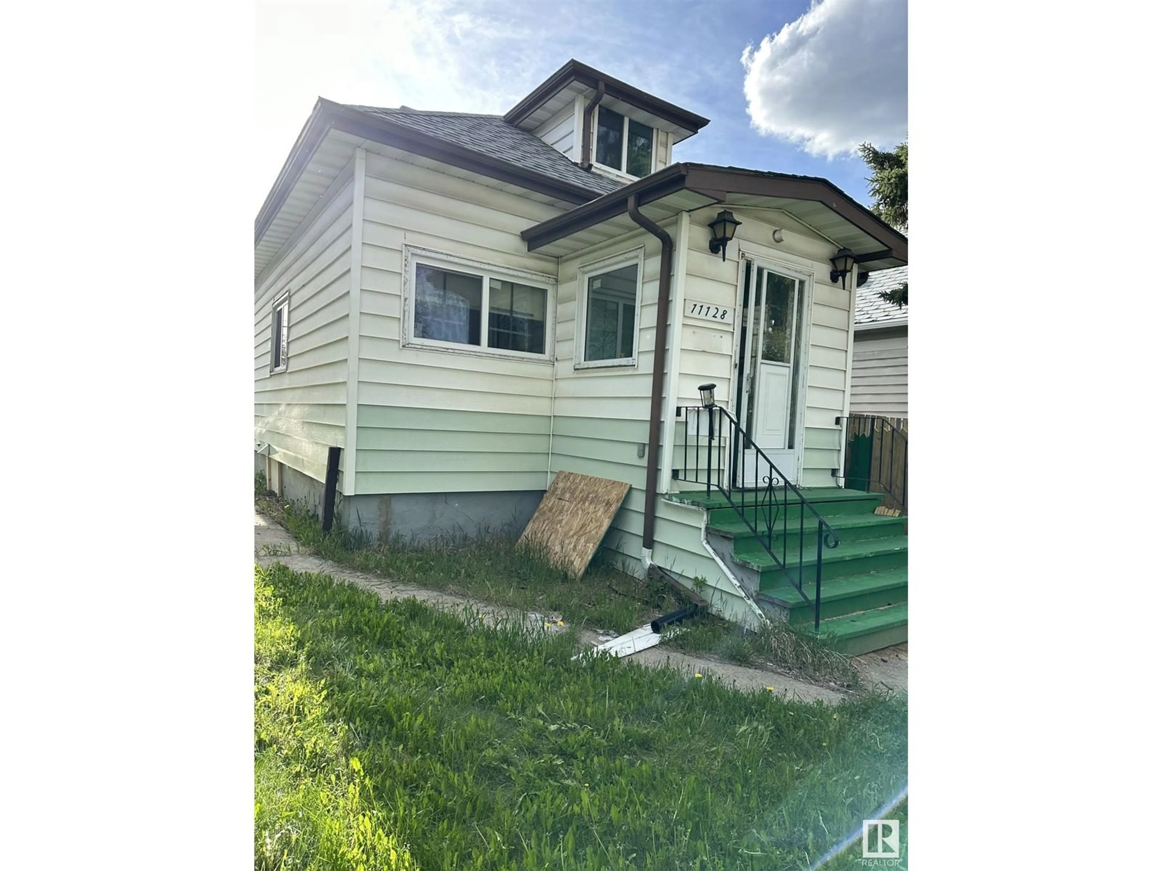 Frontside or backside of a home, cottage for 11128 95A ST NW, Edmonton Alberta T5G1N7