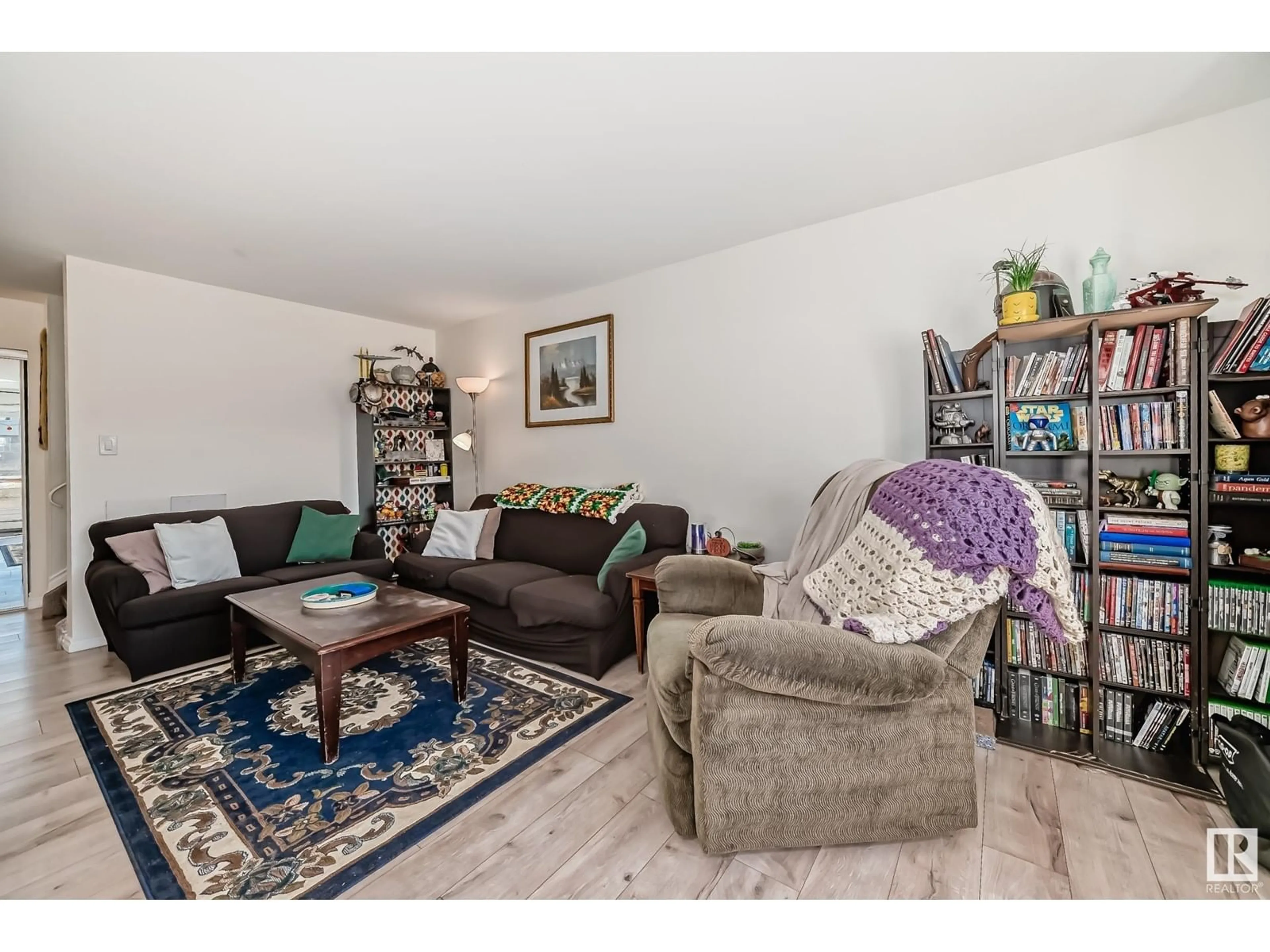 Living room, wood floors for #1 13460 FORT RD NW, Edmonton Alberta T5A1C5