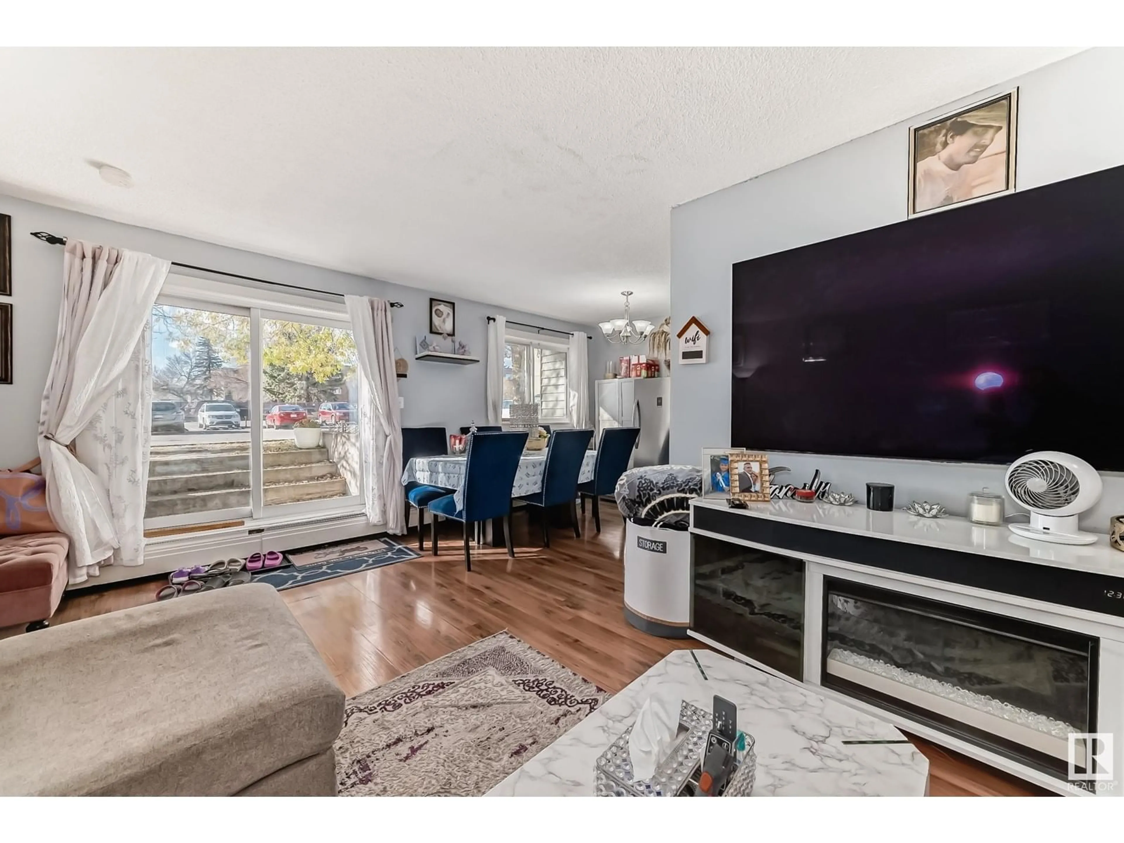 Living room, wood floors for #1 13458 FORT RD NW, Edmonton Alberta T5A1C5