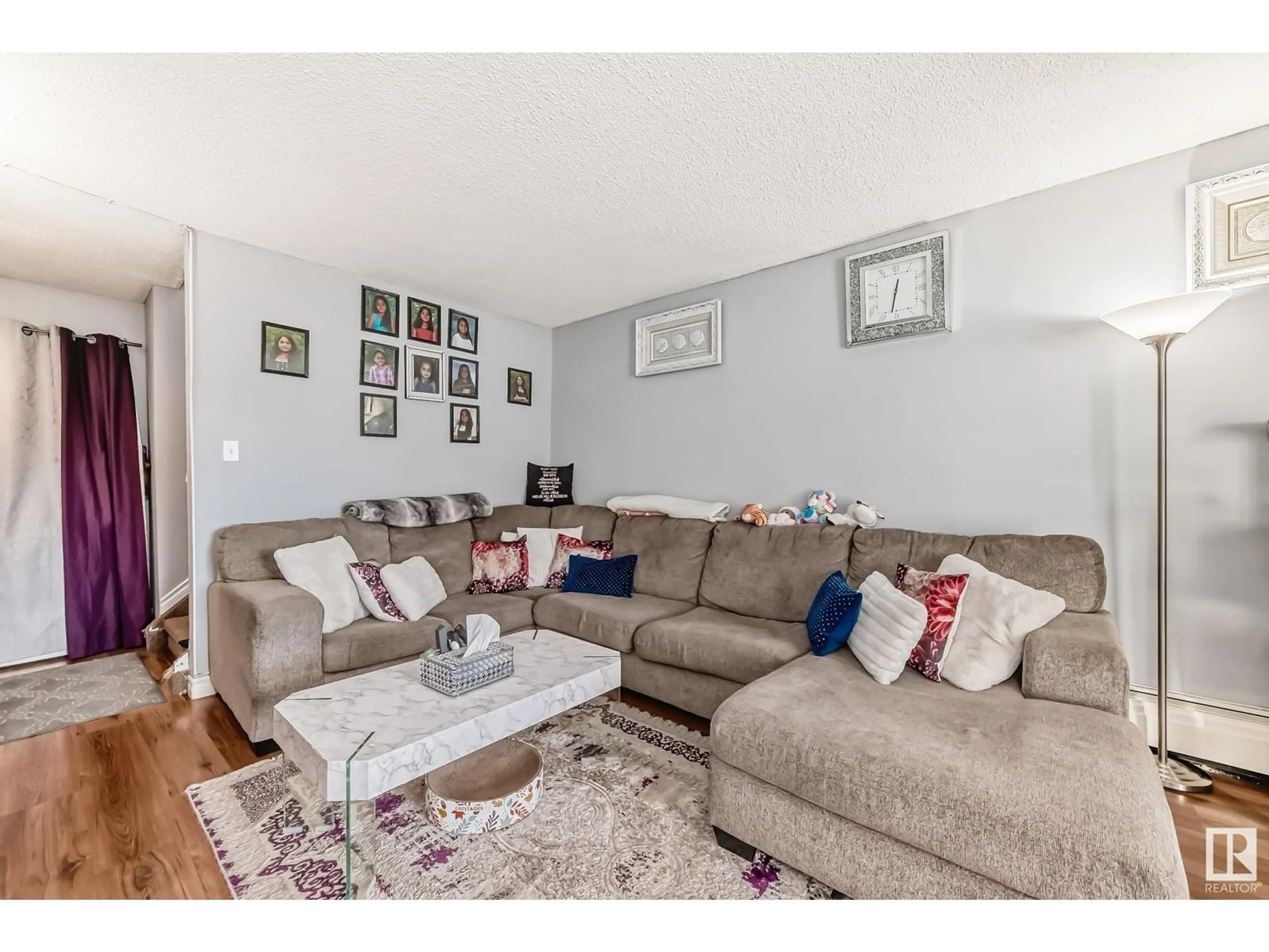 Living room, wood floors for #1 13458 FORT RD NW, Edmonton Alberta T5A1C5