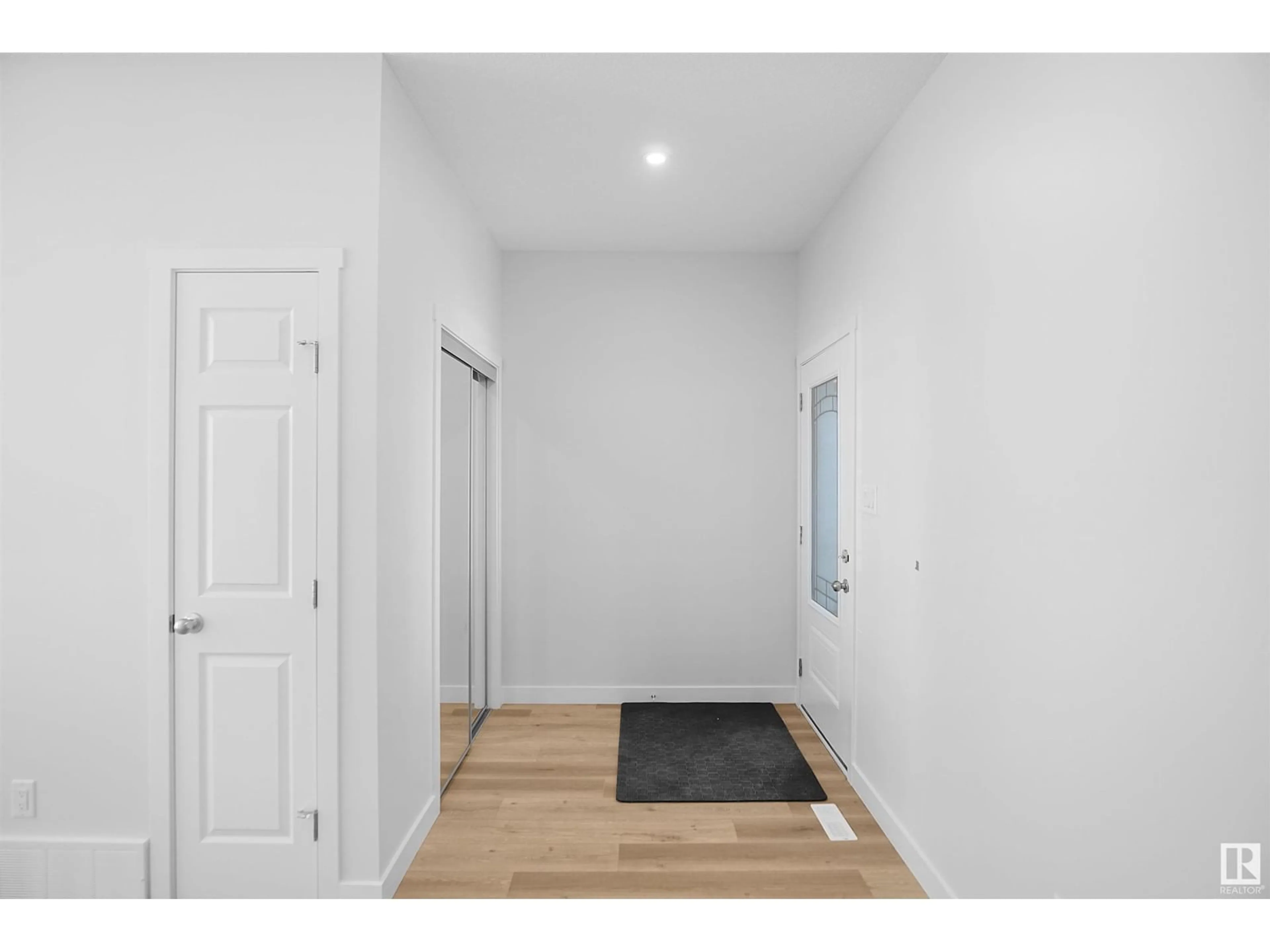 Indoor entryway, wood floors for 2025 209A ST NW, Edmonton Alberta T6M1P7