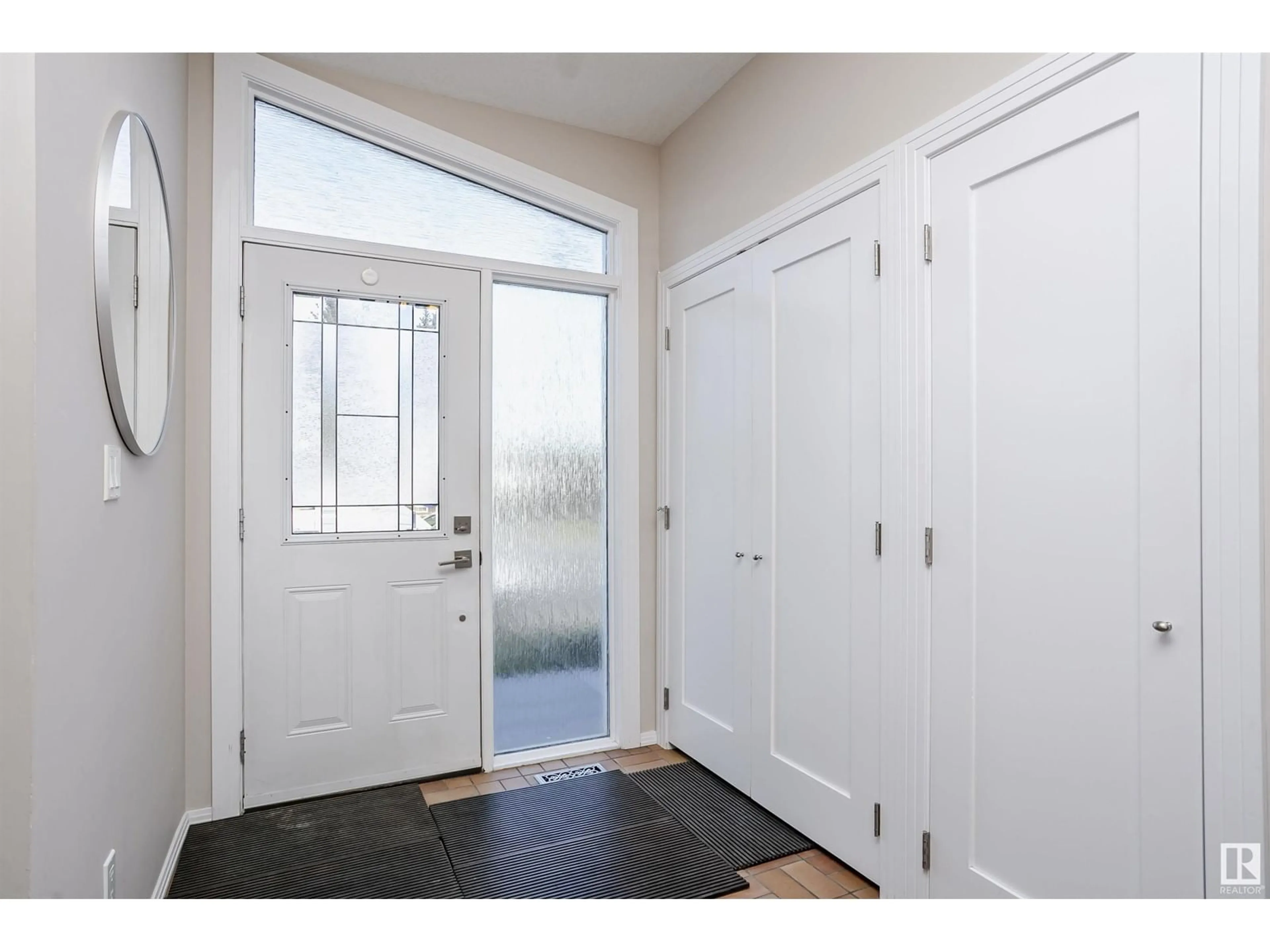 Indoor entryway, wood floors for 14719 59 AV NW, Edmonton Alberta T6H4T5