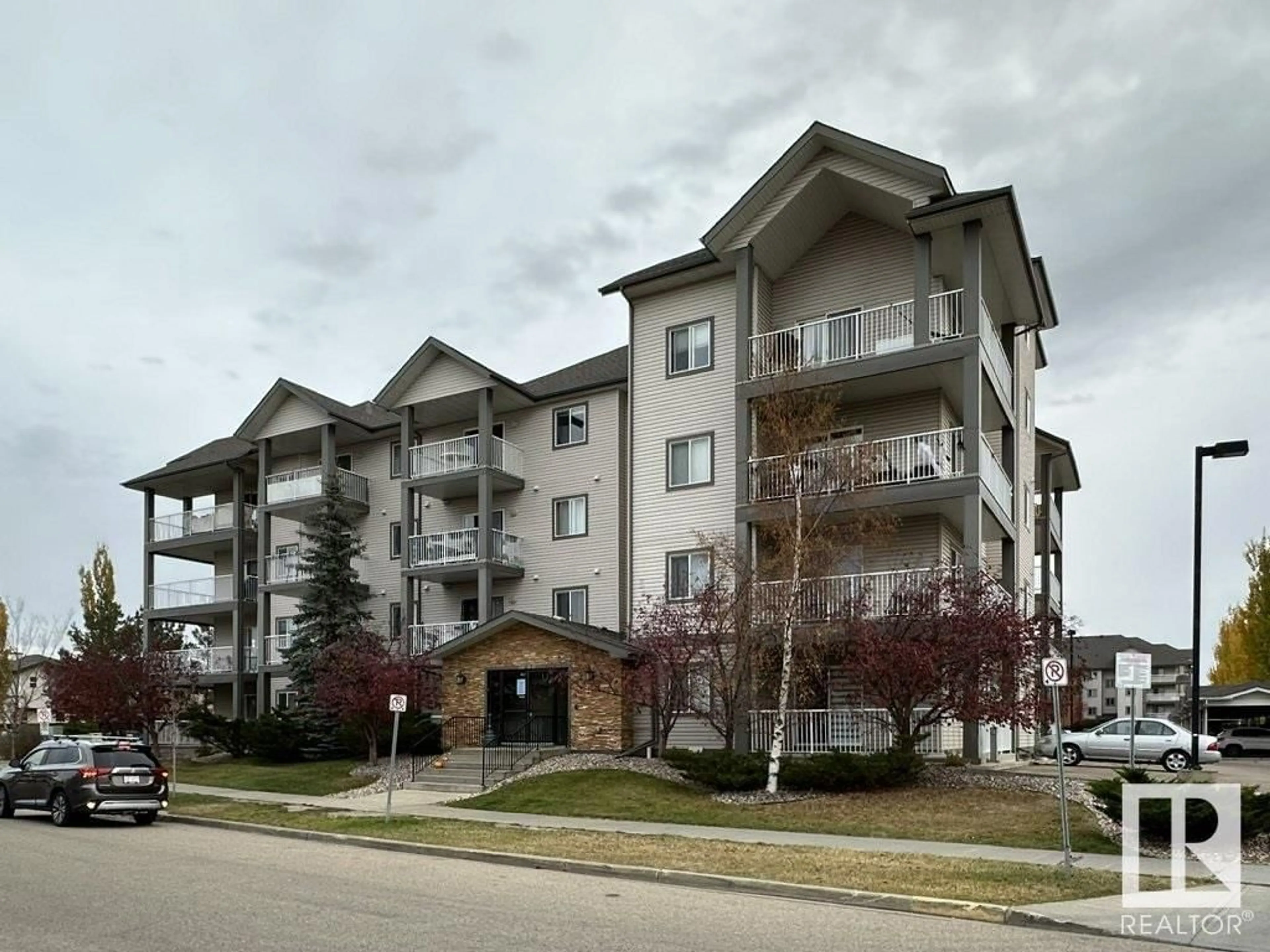 A pic from exterior of the house or condo, the front or back of building for #110 3425 19 ST NW, Edmonton Alberta T6T2B5