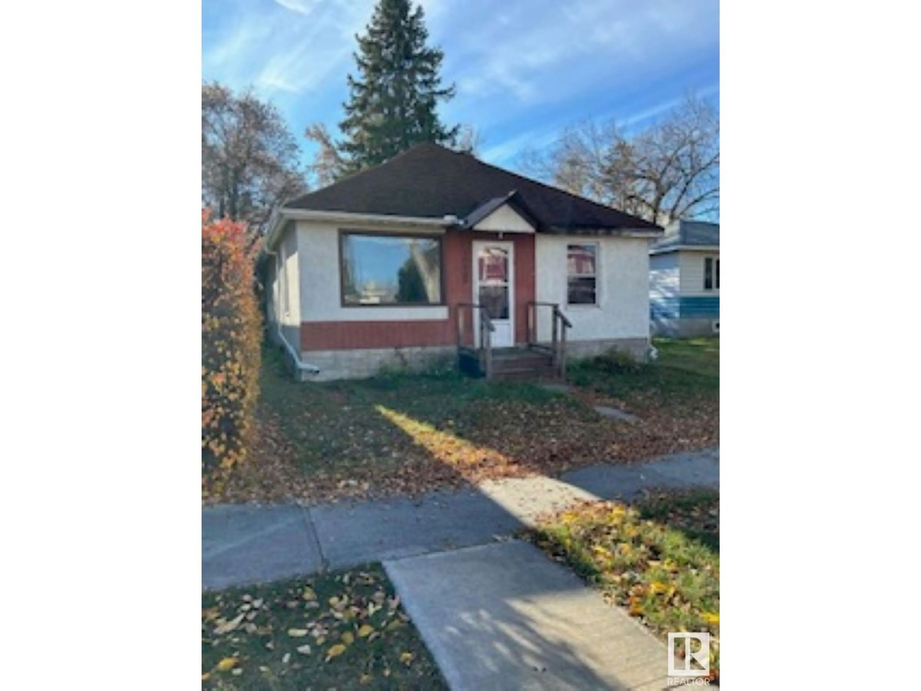 Frontside or backside of a home, cottage for 10939 68 AV N NW, Edmonton Alberta T6H2B9