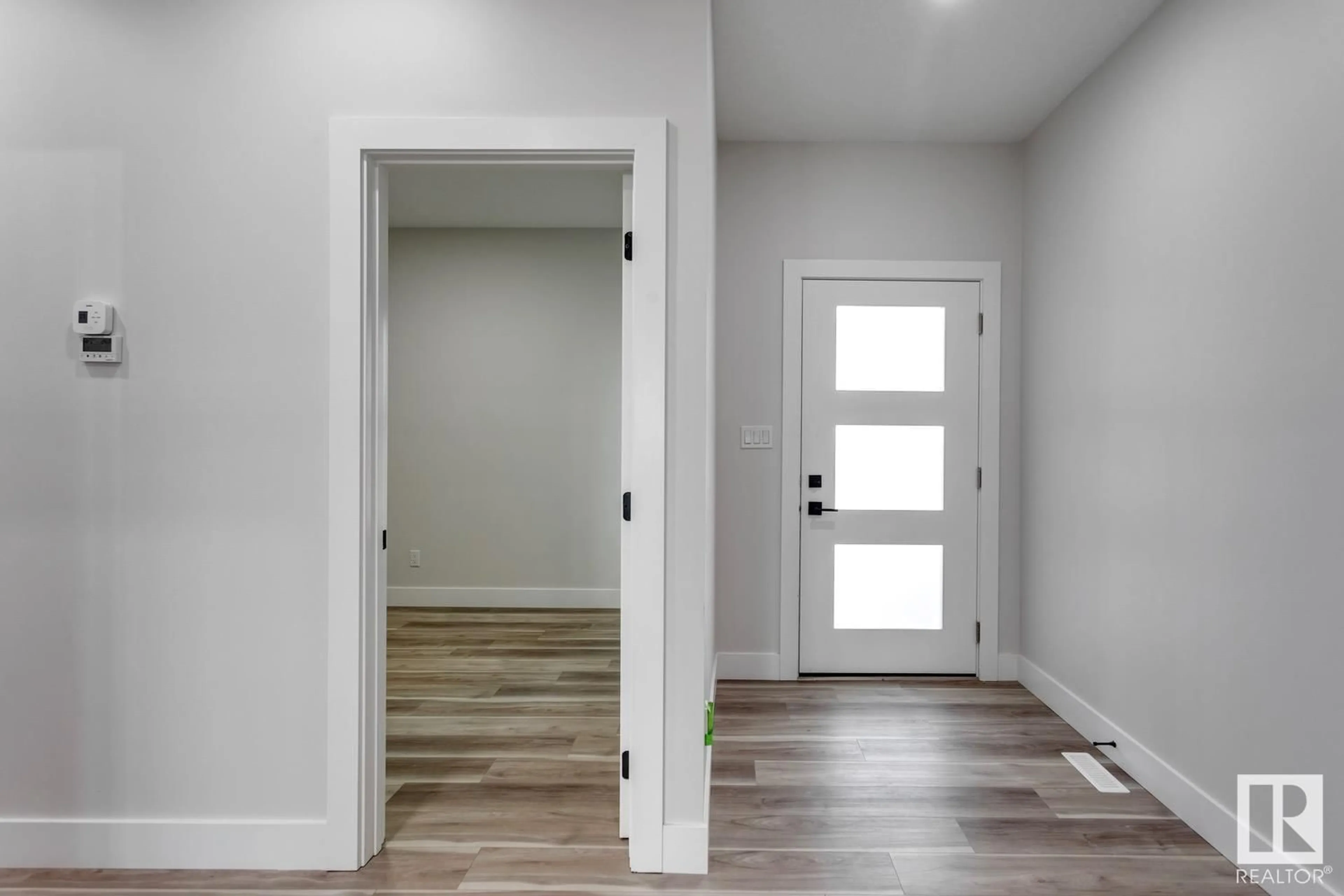 Indoor entryway, wood floors for 6263 19 ST NE, Rural Leduc County Alberta T4X3C8