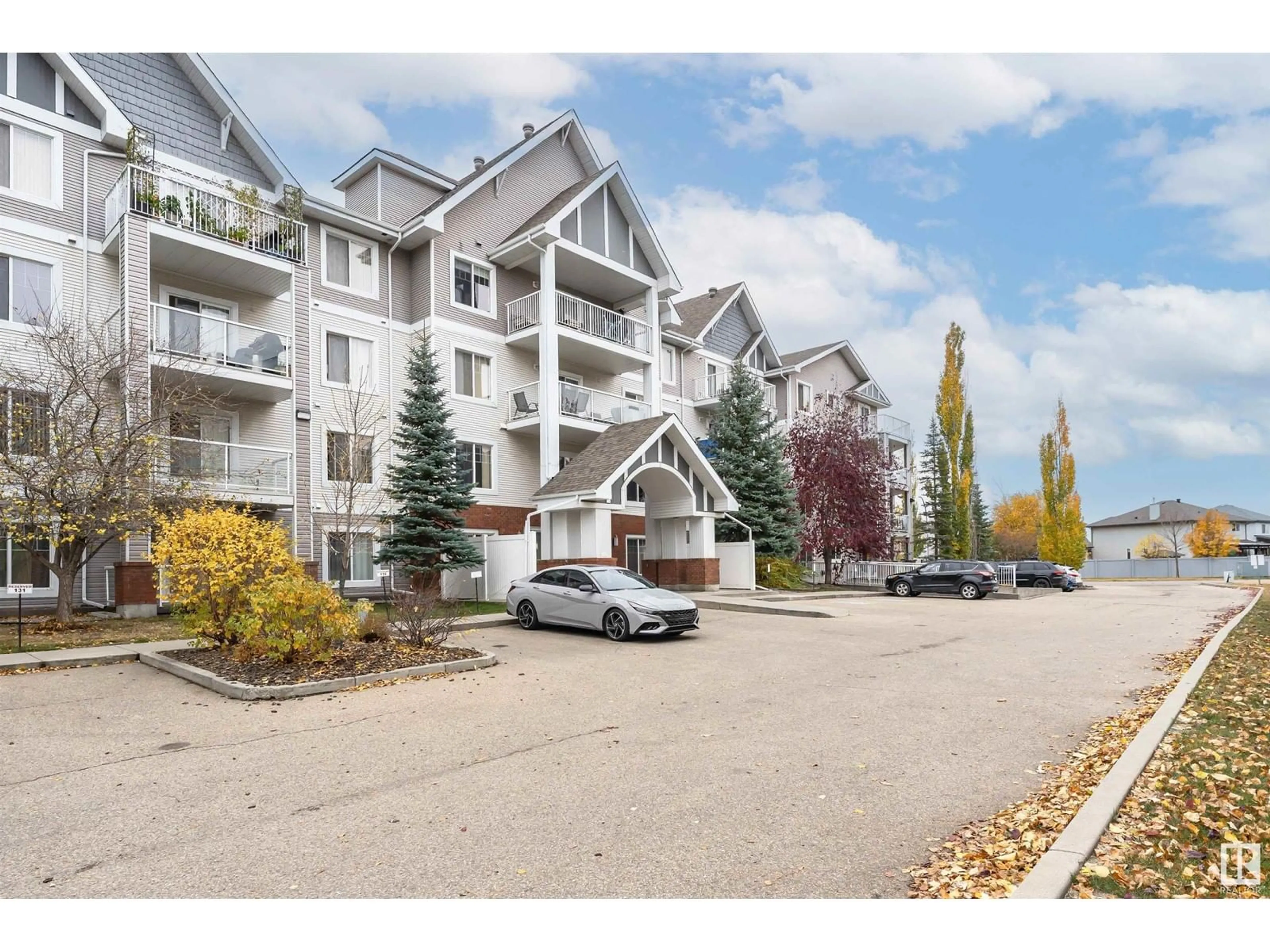 A pic from exterior of the house or condo, the street view for #301 13710 150 AV NW, Edmonton Alberta T6V0B2