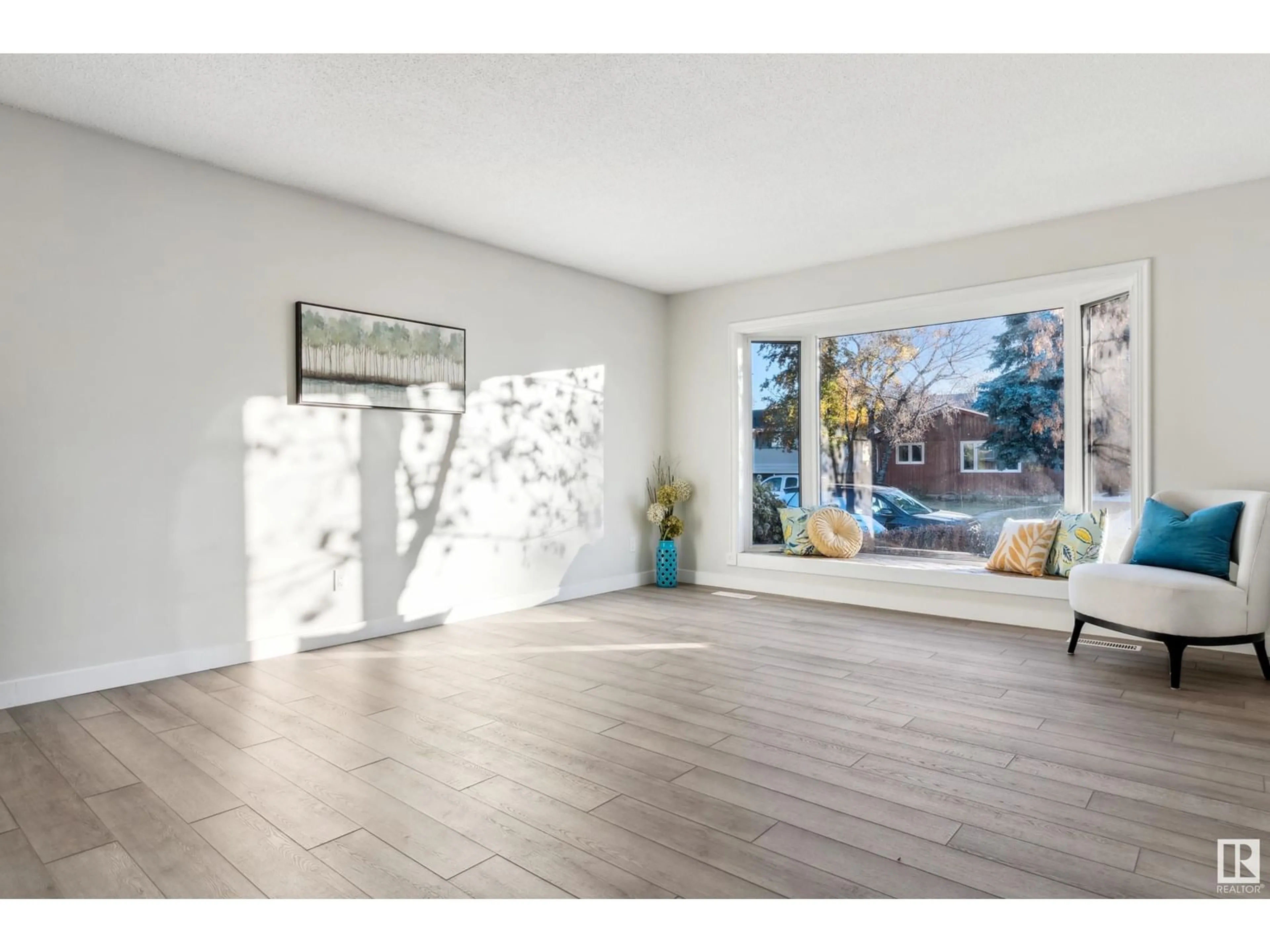 Indoor entryway, wood floors for 2924 68 ST NW, Edmonton Alberta T6K1N6