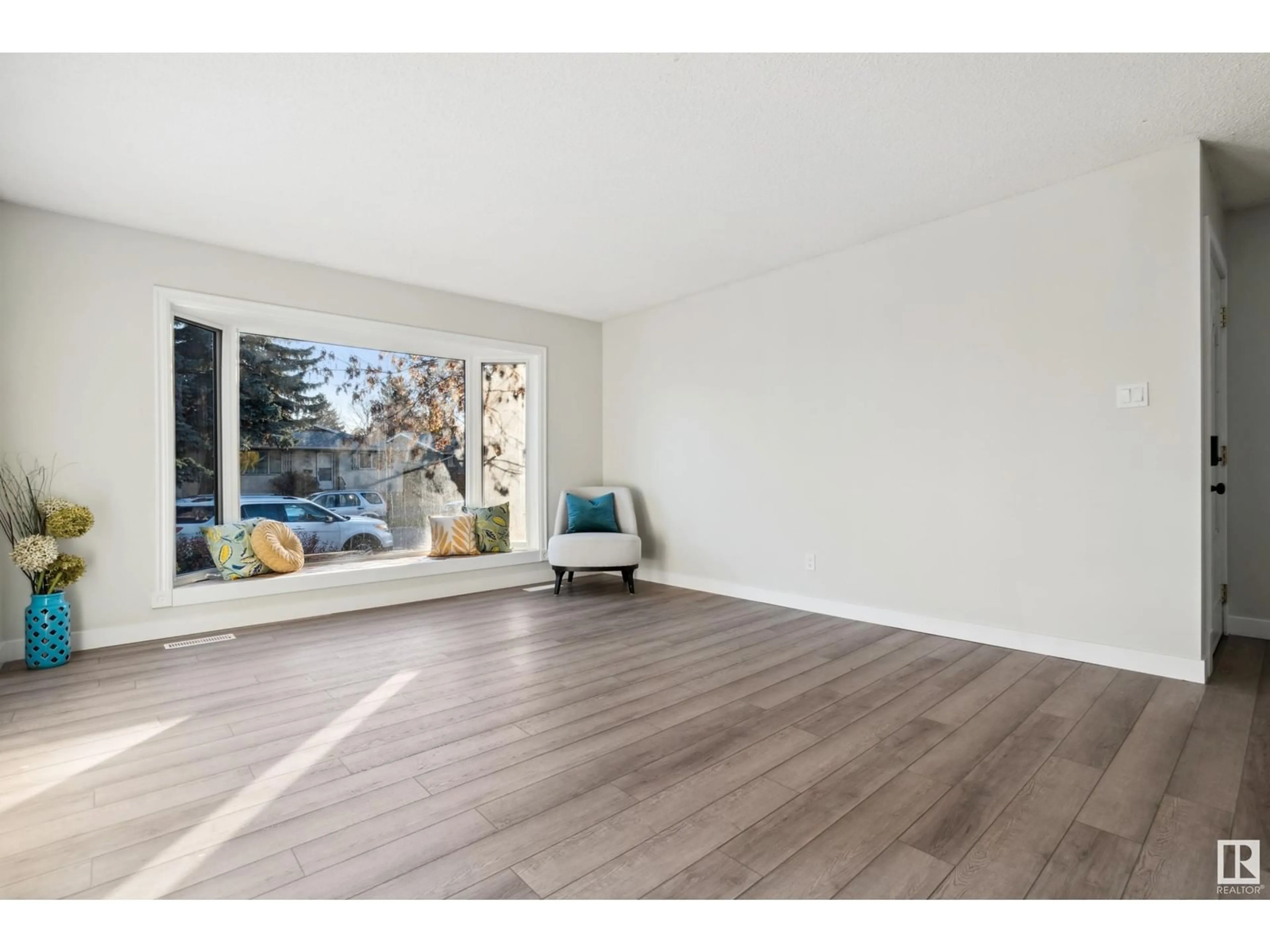 A pic of a room, wood floors for 2924 68 ST NW, Edmonton Alberta T6K1N6