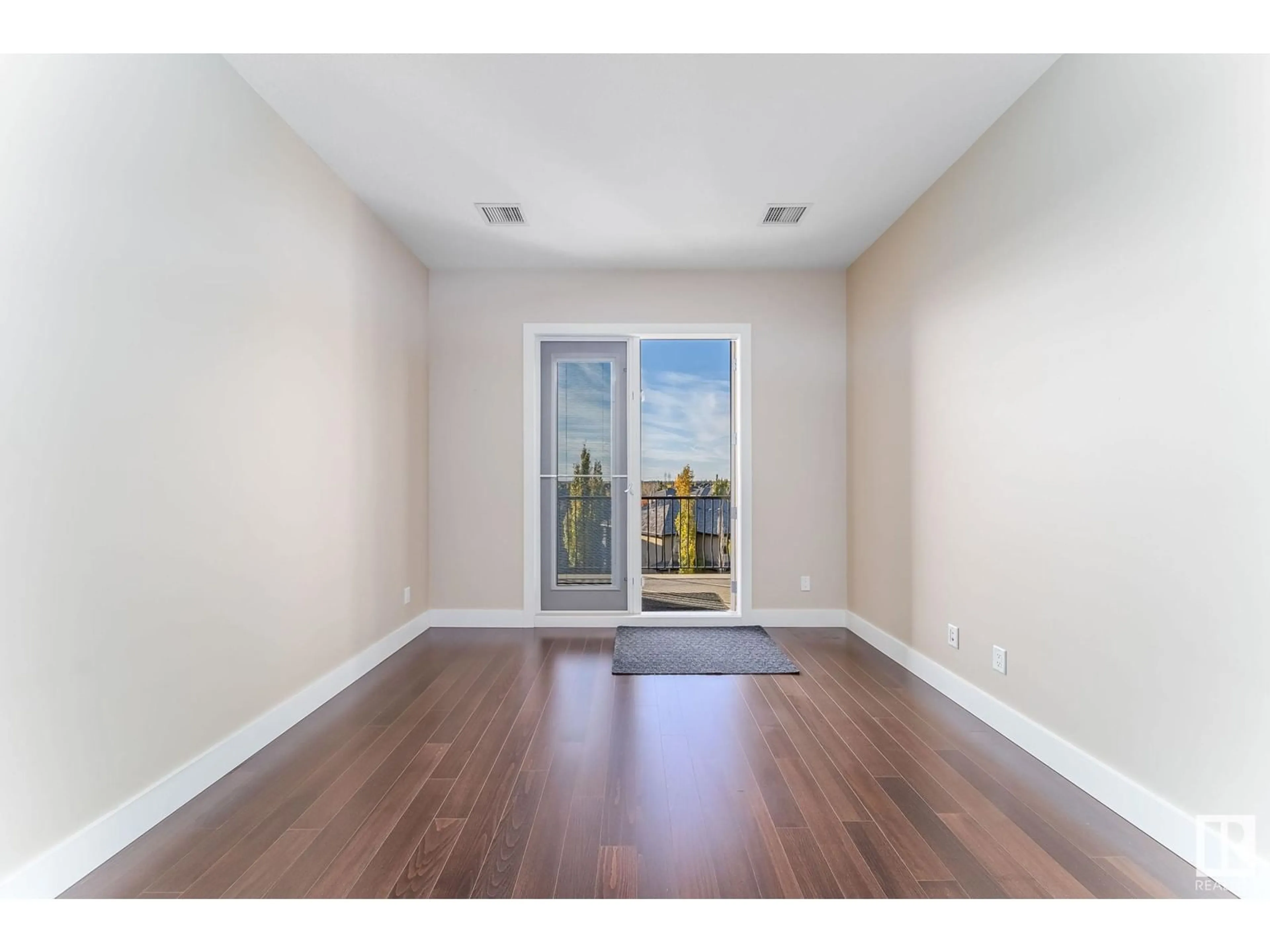 A pic of a room, wood floors for #450 6079 MAYNARD WY NW, Edmonton Alberta T6R0S4