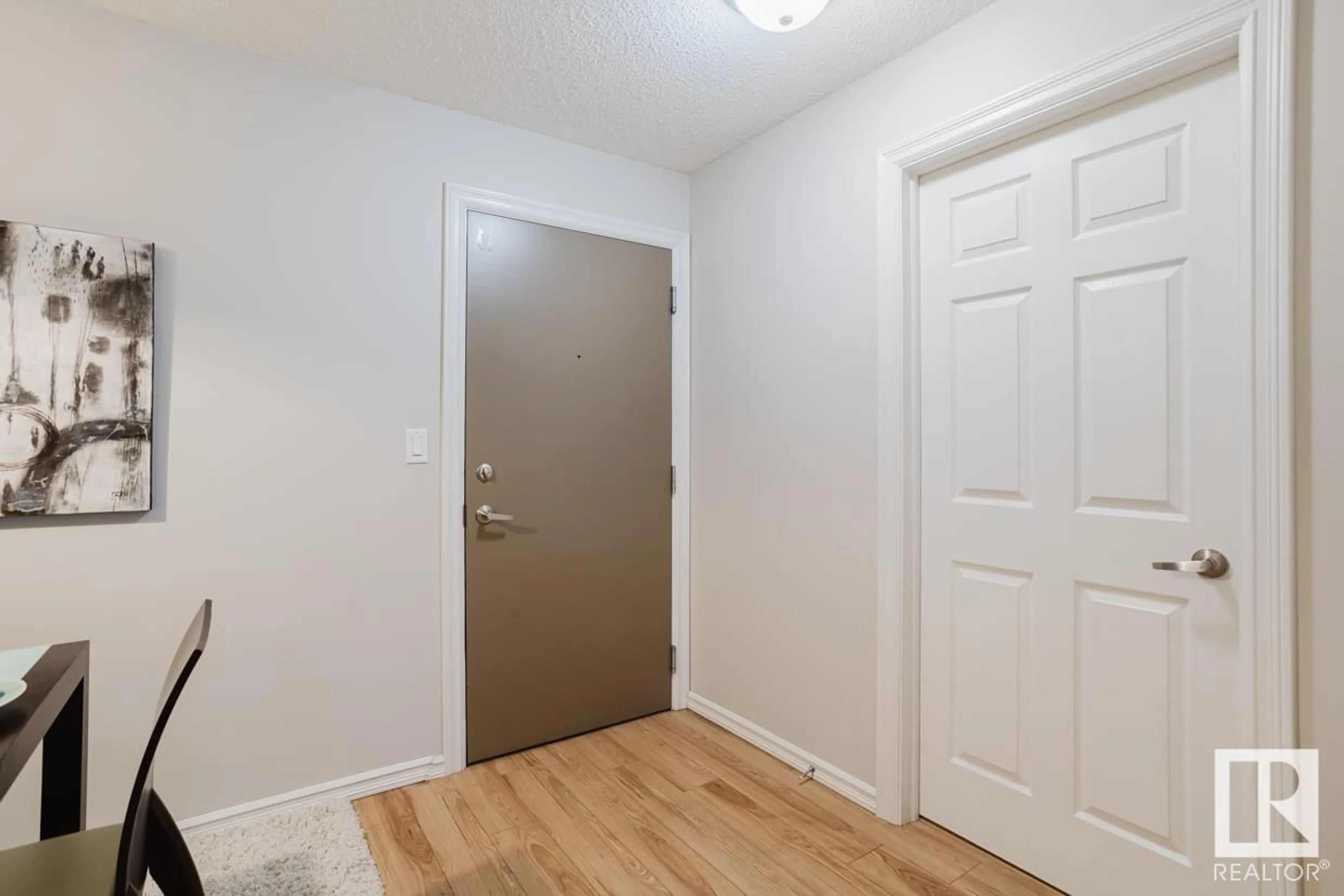 Indoor entryway, wood floors for #210 4403 23 ST NW, Edmonton Alberta T6T0B6