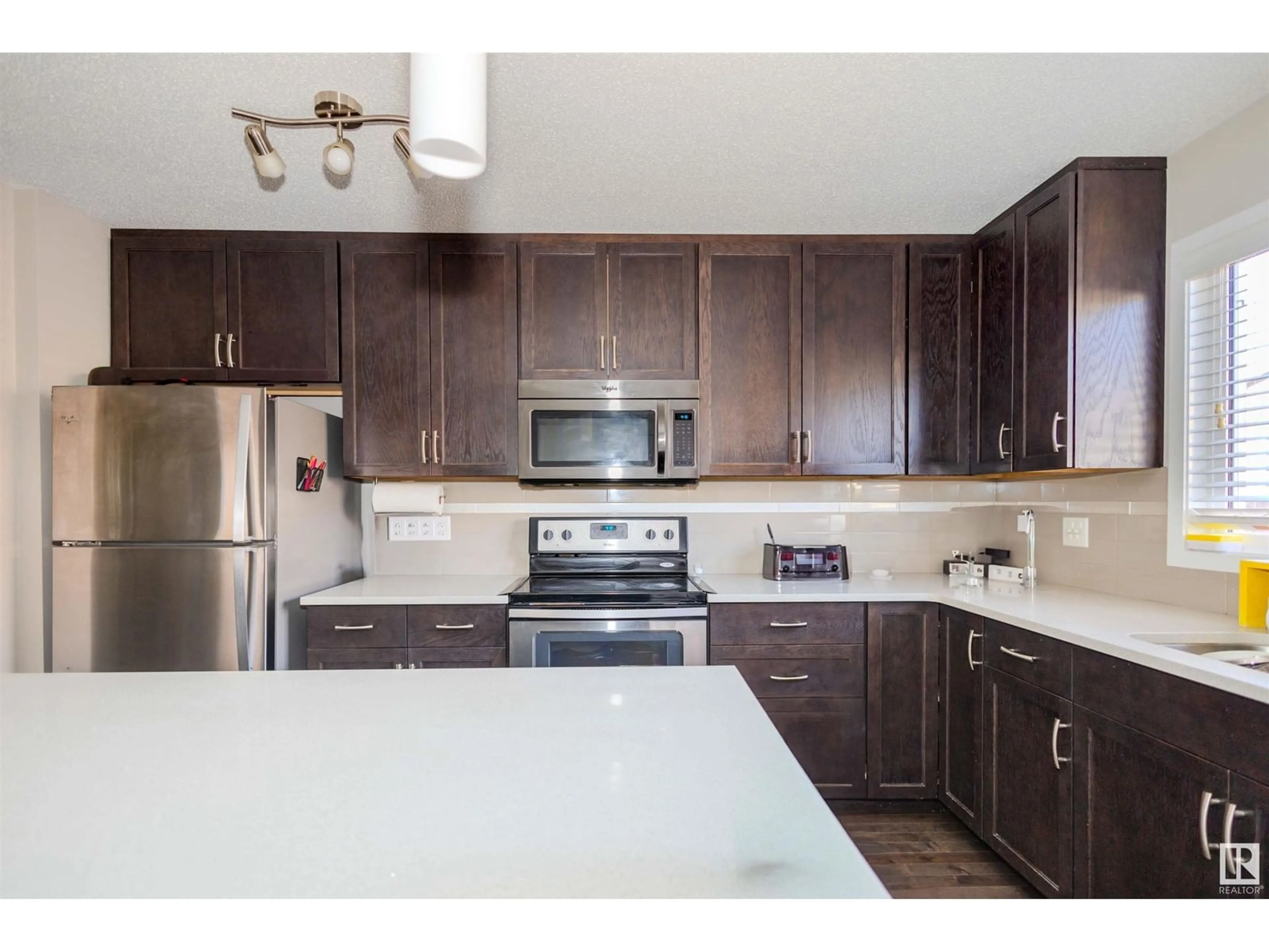 Open concept kitchen for 1083 WATT PROMENADE SW SW SW, Edmonton Alberta T6X1T7