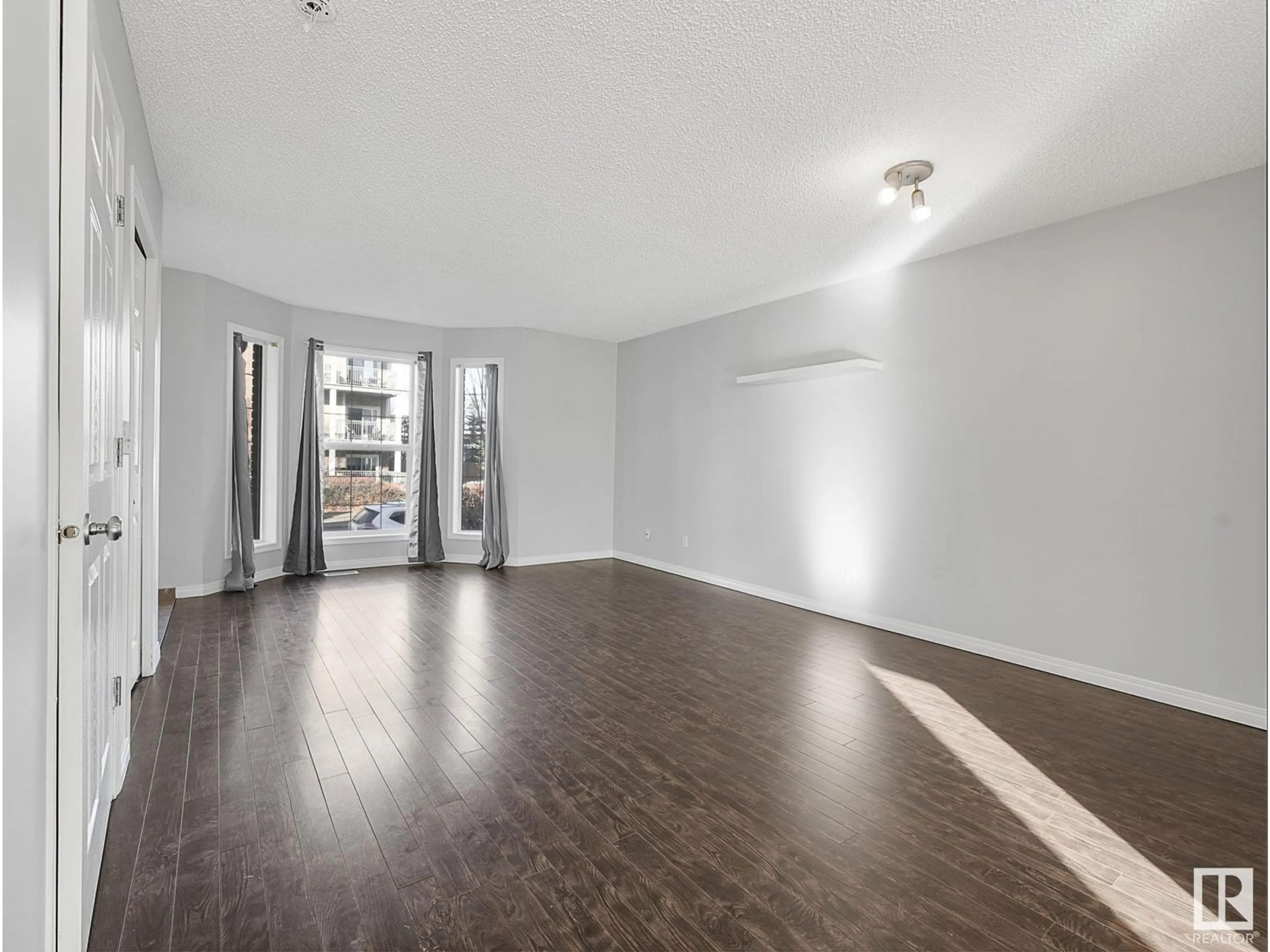 A pic of a room, wood floors for #3 5281 Terwillegar BV NW, Edmonton Alberta T5Z2T1