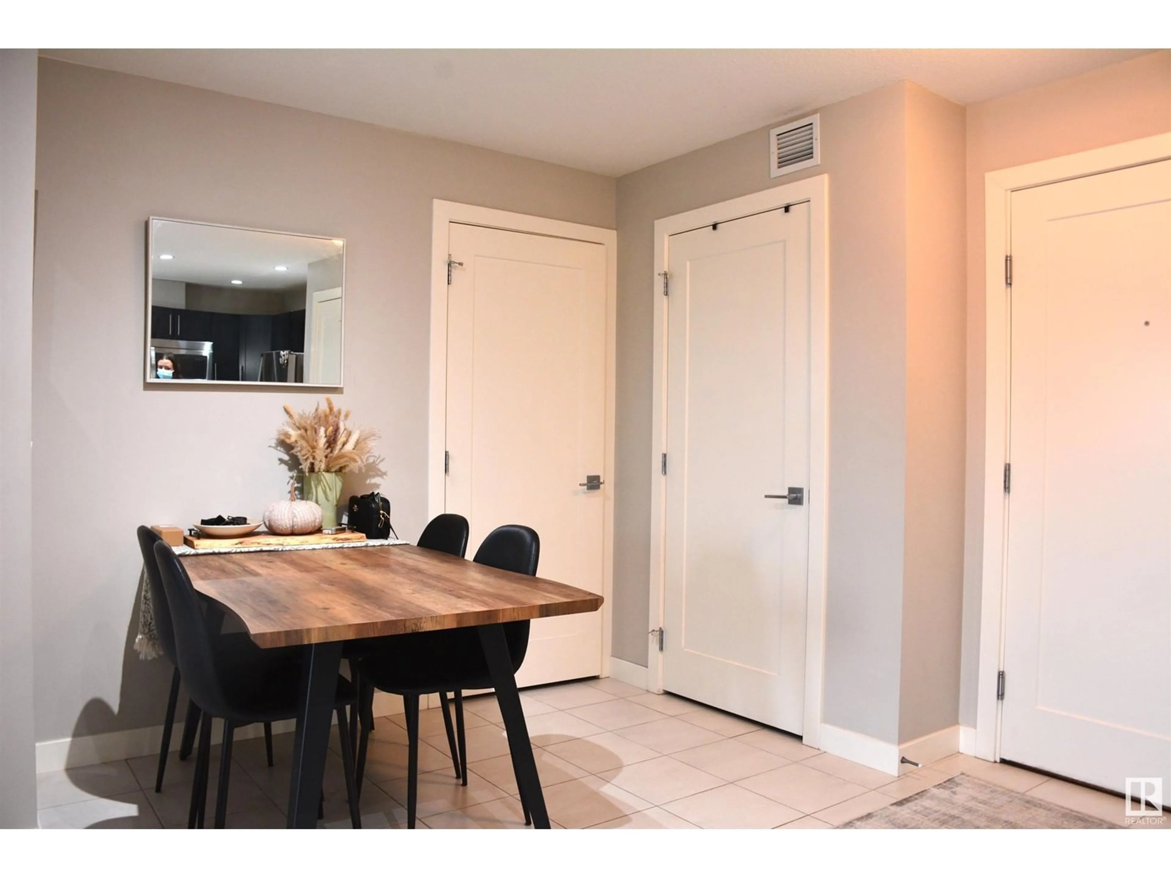 Dining room, wood floors for #310 1031 173 ST SW, Edmonton Alberta T6E3E4