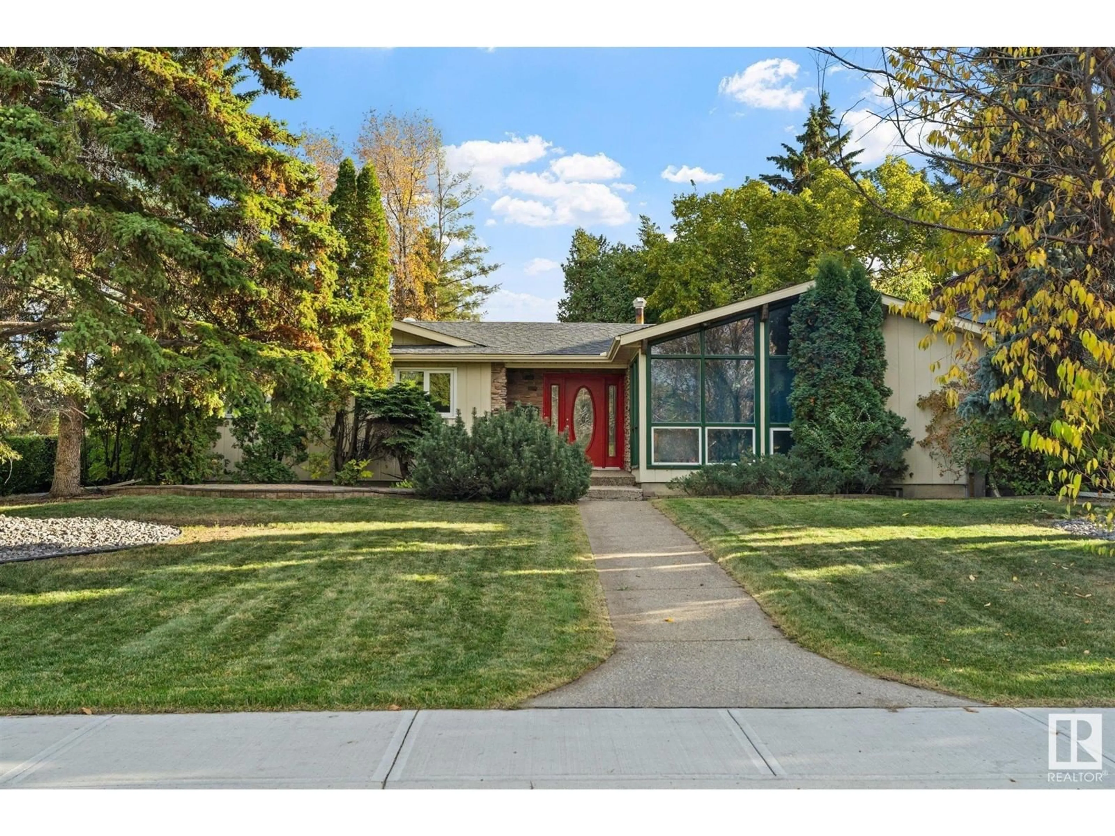 Frontside or backside of a home, the street view for 12603 65 AV NW, Edmonton Alberta T6H1W7