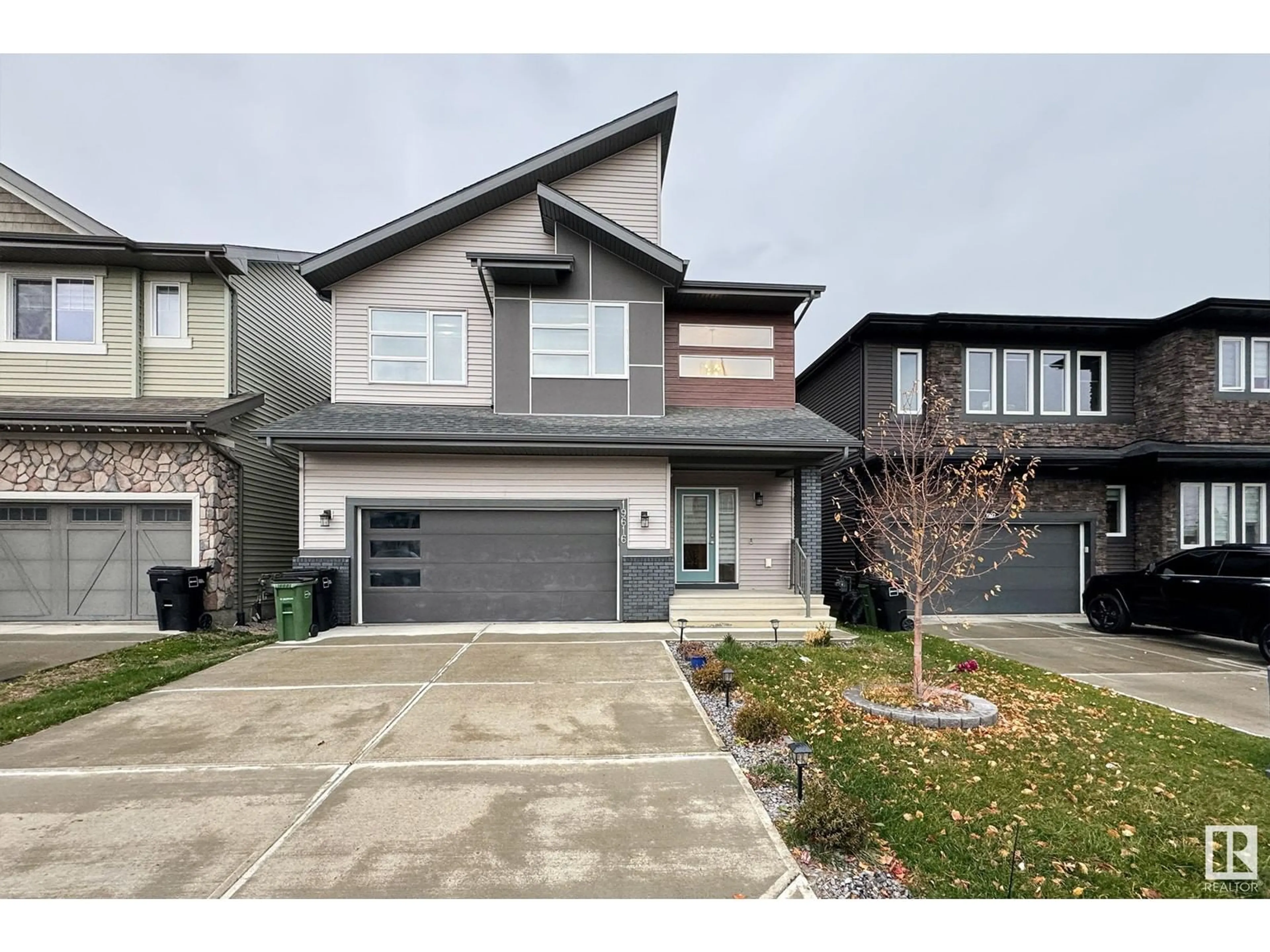 Frontside or backside of a home, the street view for 19616 26 AV NW, Edmonton Alberta T6M0X4