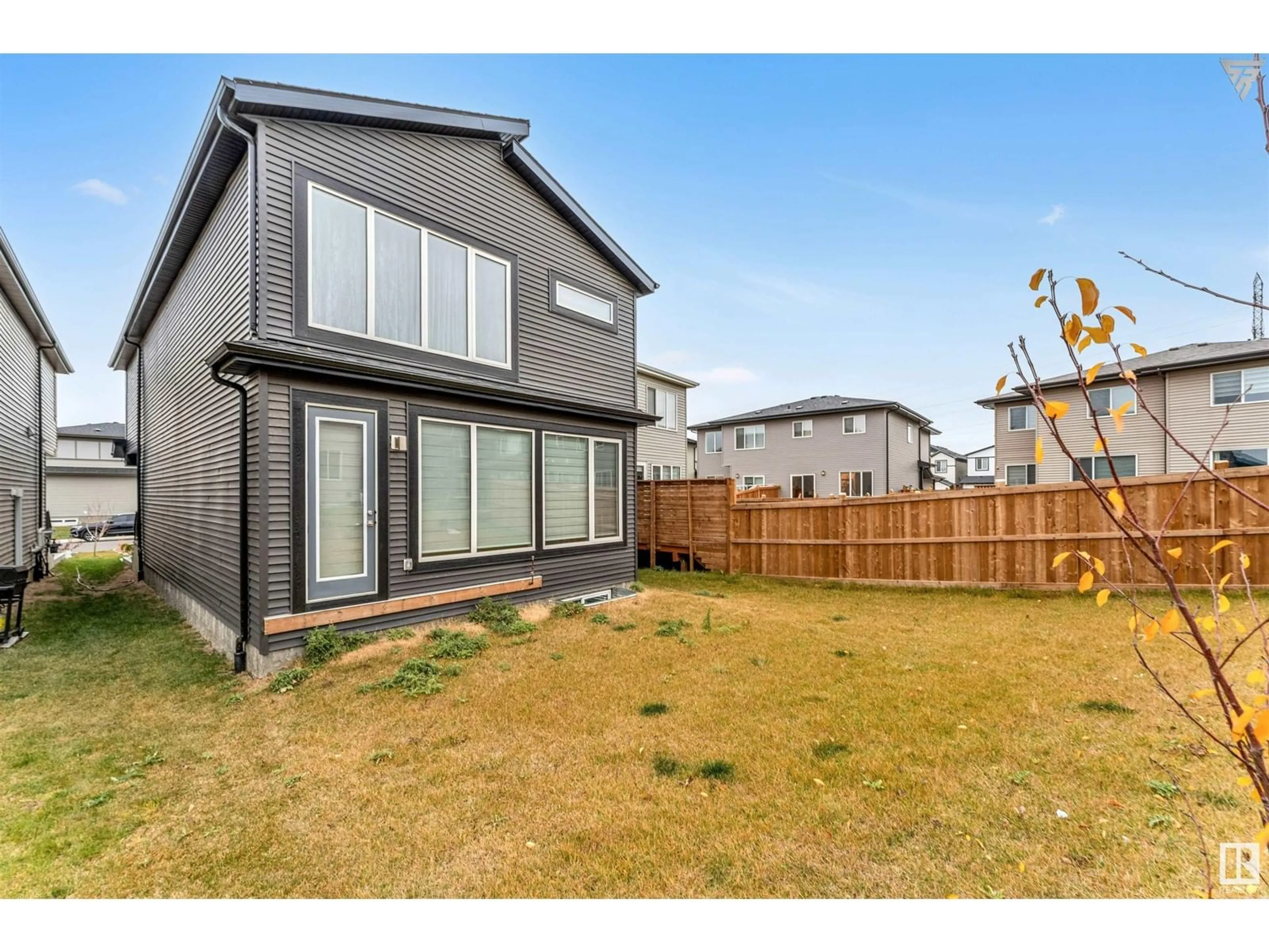 Frontside or backside of a home, the fenced backyard for 9222 PEAR DR SW, Edmonton Alberta T6X2Z4