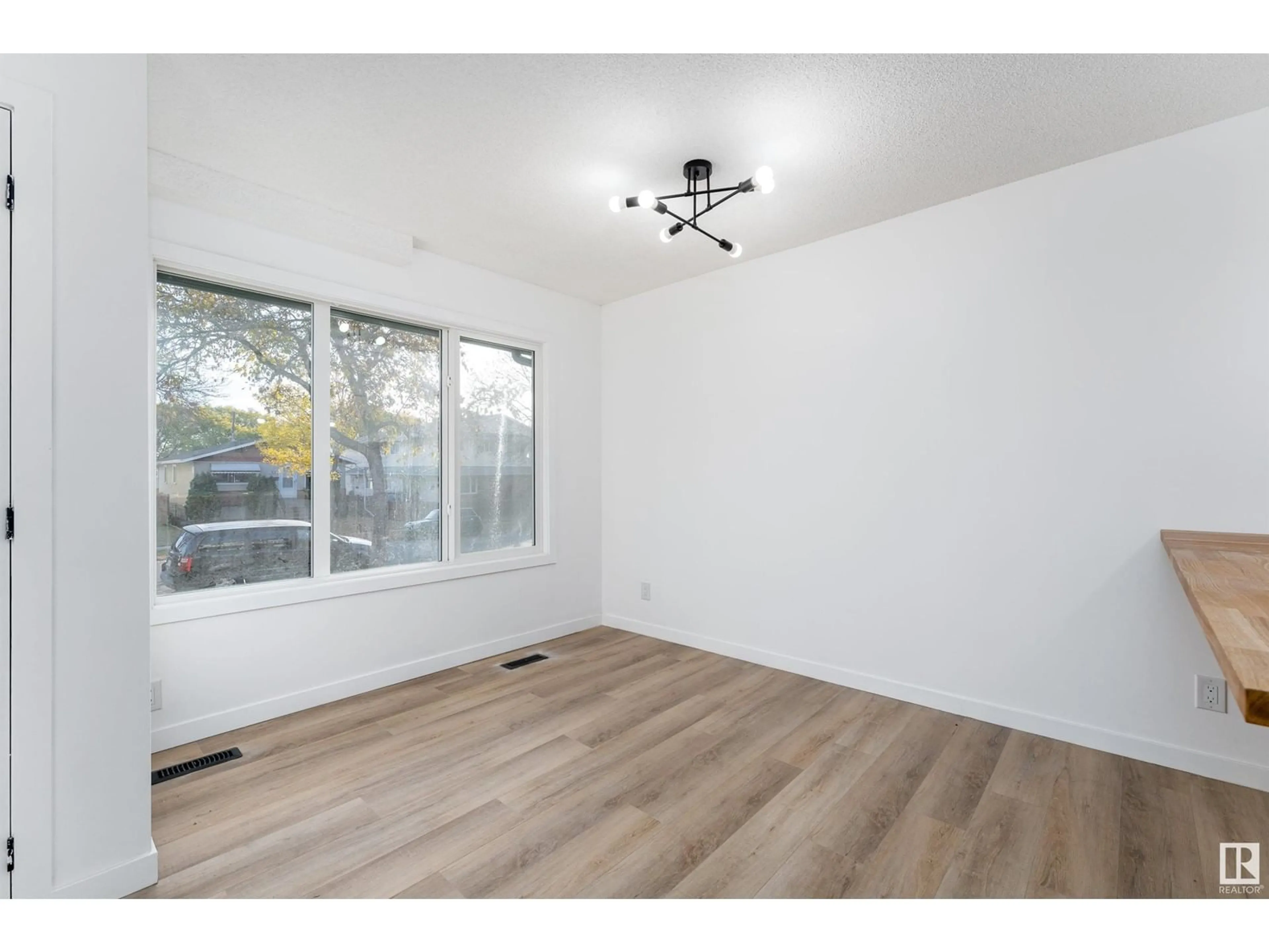 A pic of a room, wood floors for 13126 / 13128 65 ST NW, Edmonton Alberta T5X4Z5