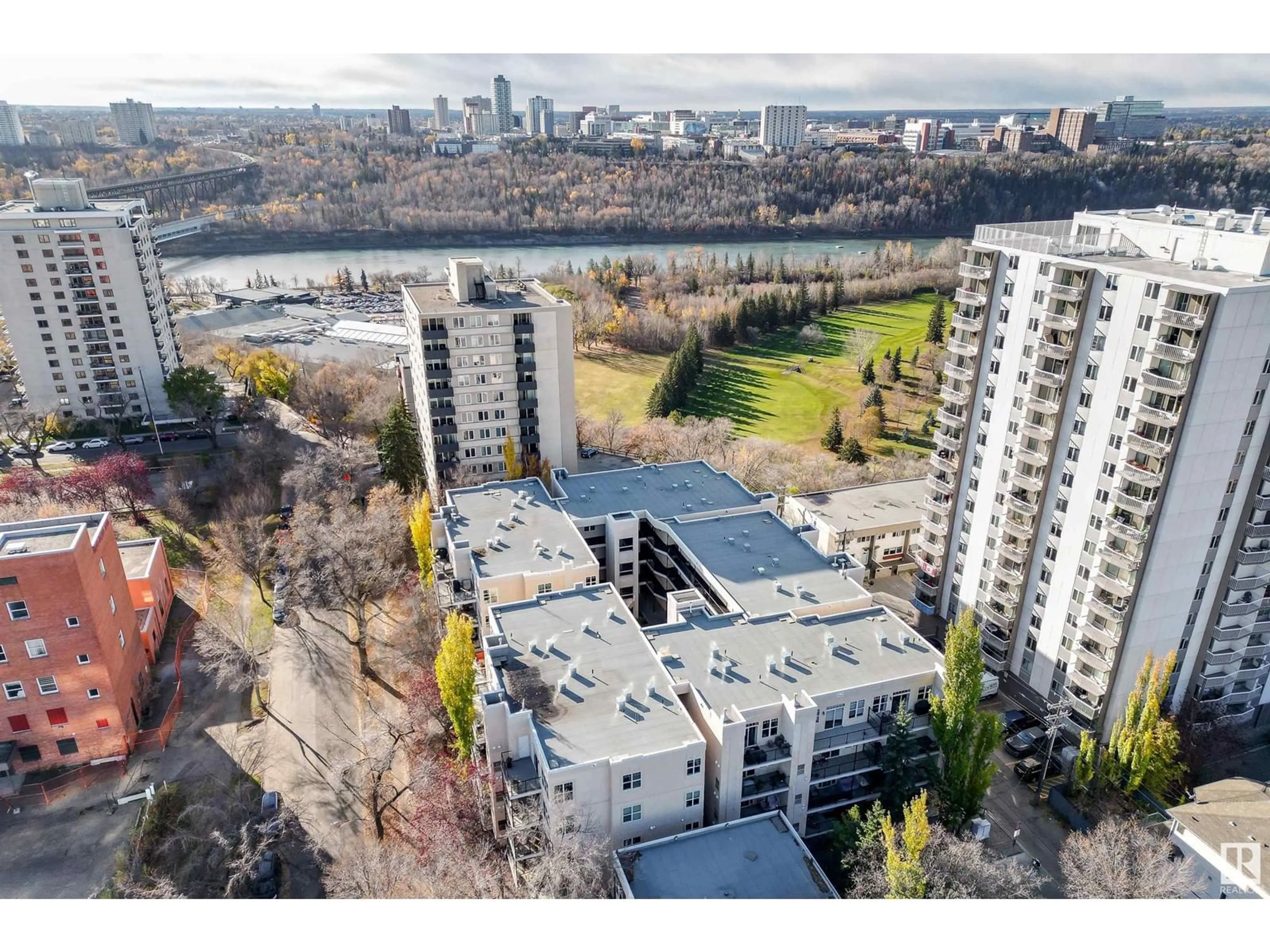 A pic from exterior of the house or condo, the view of city buildings for #112 9828 112 ST NW, Edmonton Alberta T5K1L4