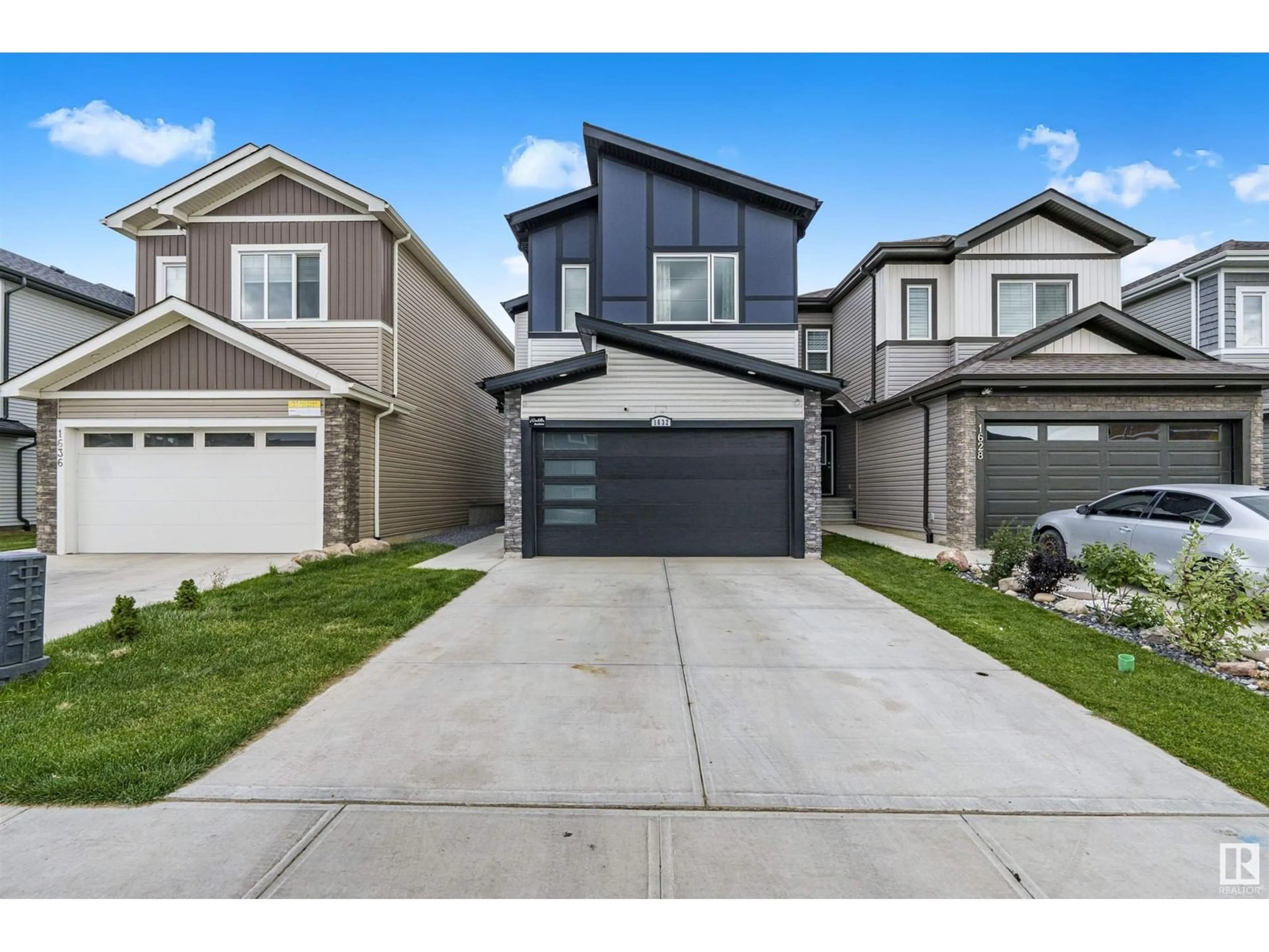 Frontside or backside of a home, the street view for 1632 14 AV NW, Edmonton Alberta T6T2S4