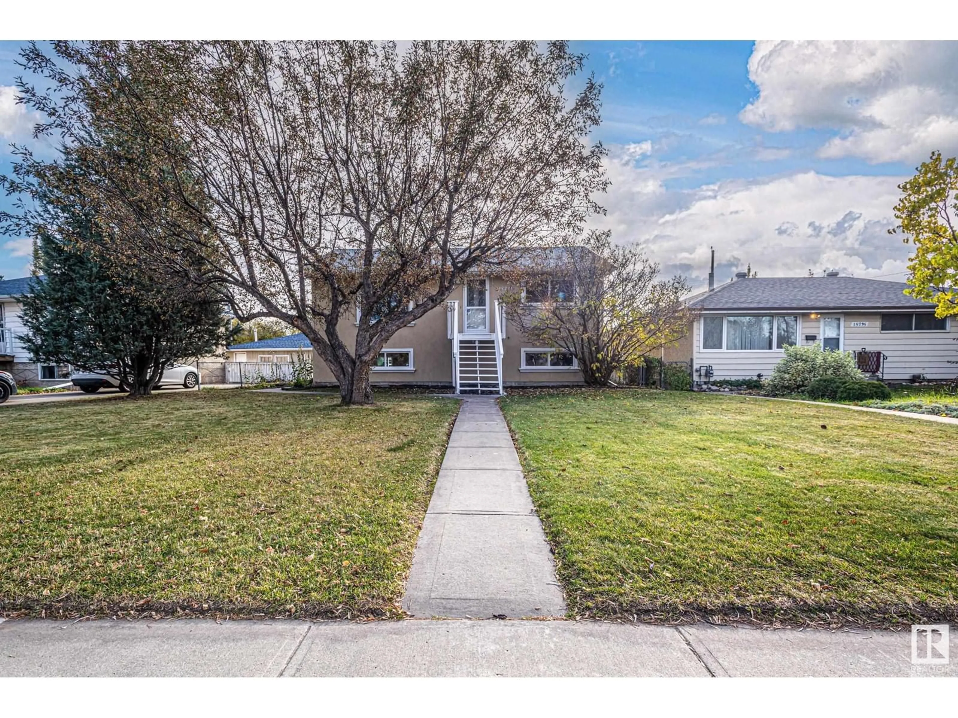 Frontside or backside of a home, the street view for 15731 110B AV NW, Edmonton Alberta T5P1J3