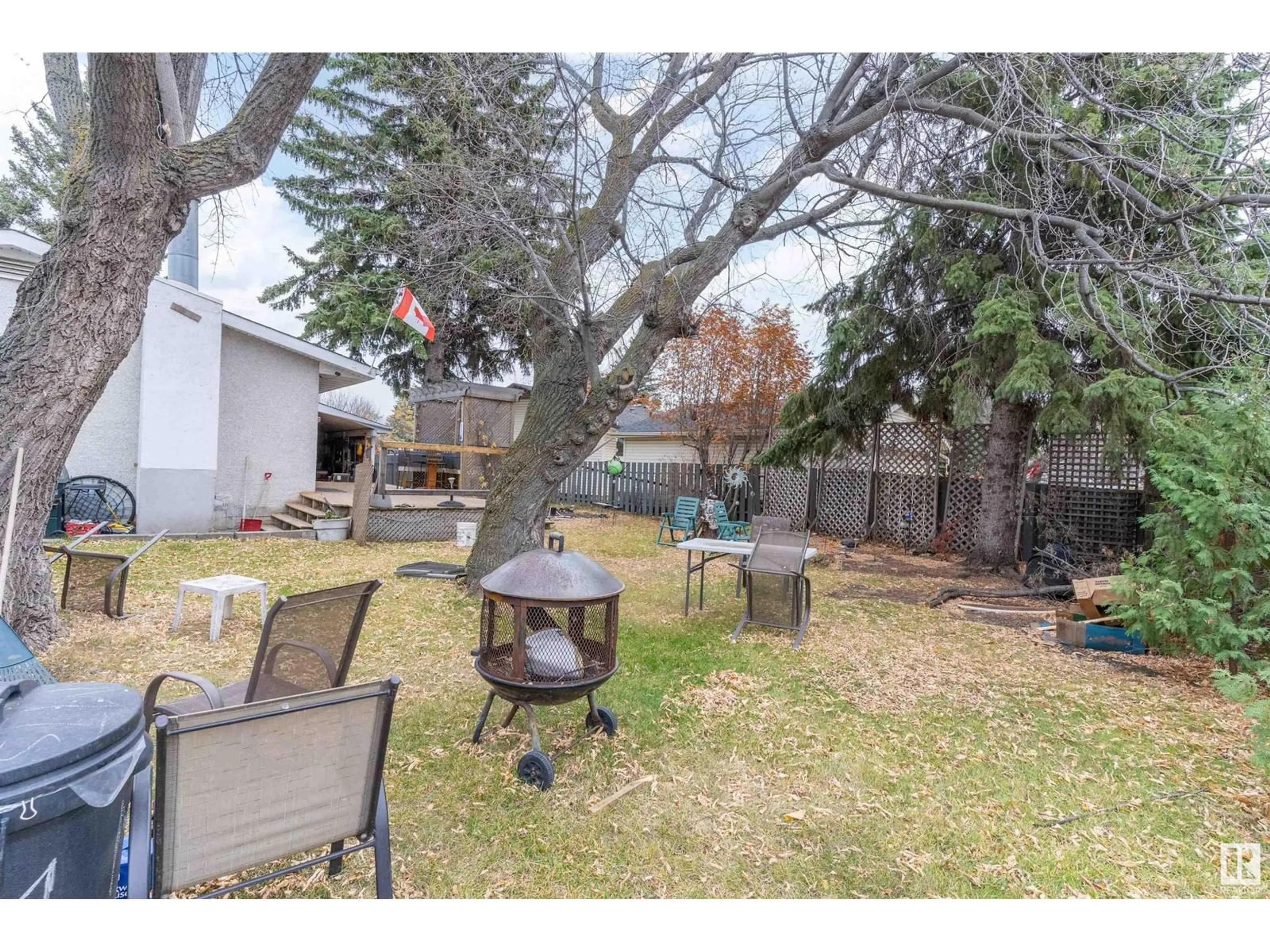 Patio, the fenced backyard for 8506 153 ST NW NW, Edmonton Alberta T5R1N7