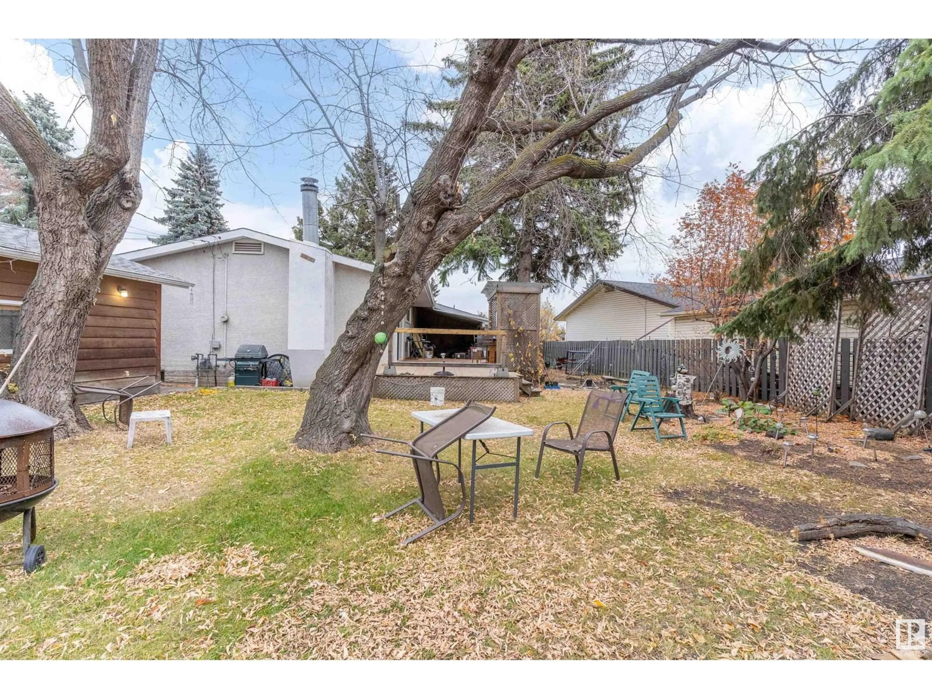 Patio, the fenced backyard for 8506 153 ST NW NW, Edmonton Alberta T5R1N7