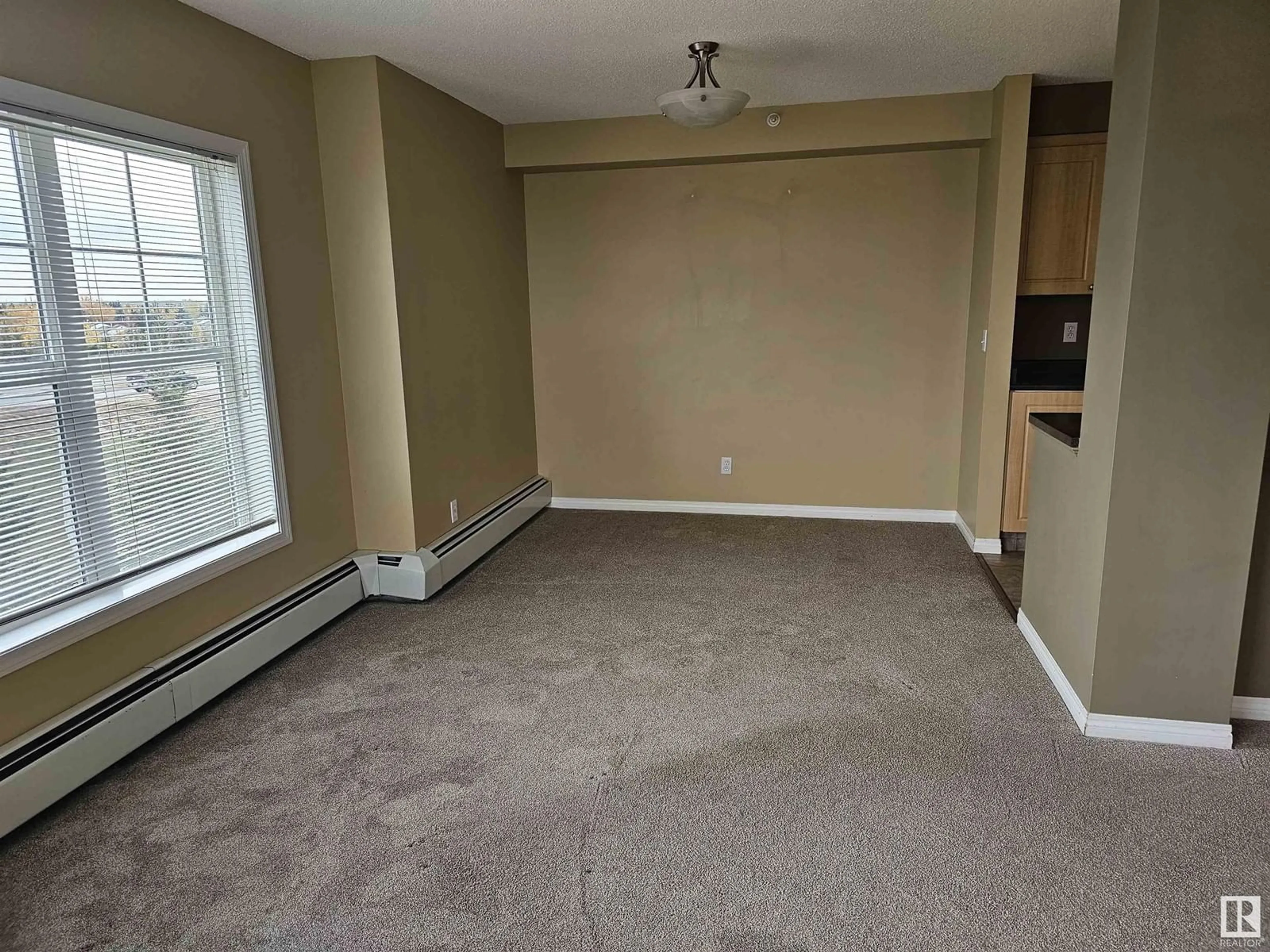 A pic of a room, carpet floors for #406 636 MCALLISTER LO SW, Edmonton Alberta T5W1N4