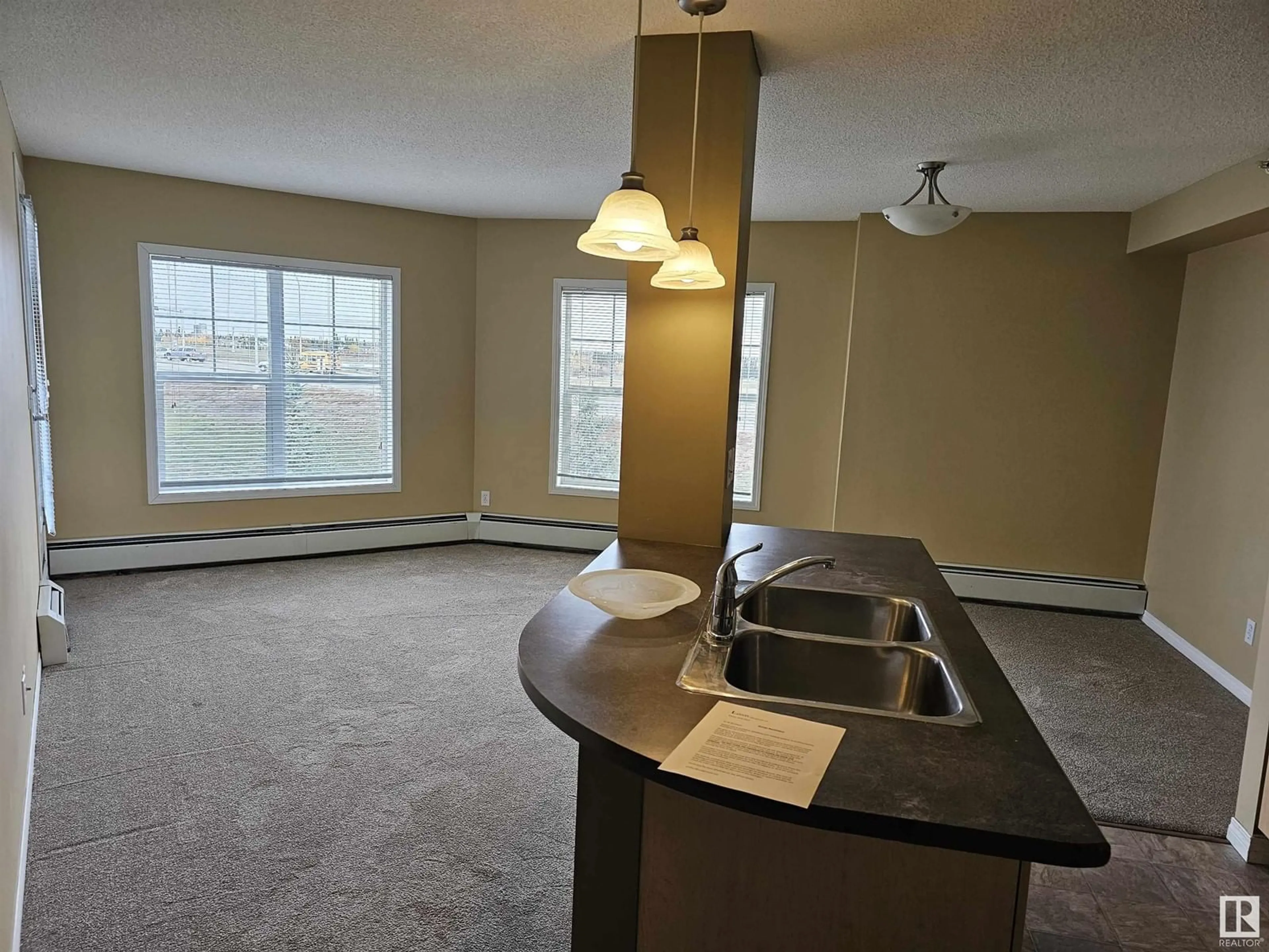 A pic of a room, wood floors for #406 636 MCALLISTER LO SW, Edmonton Alberta T5W1N4