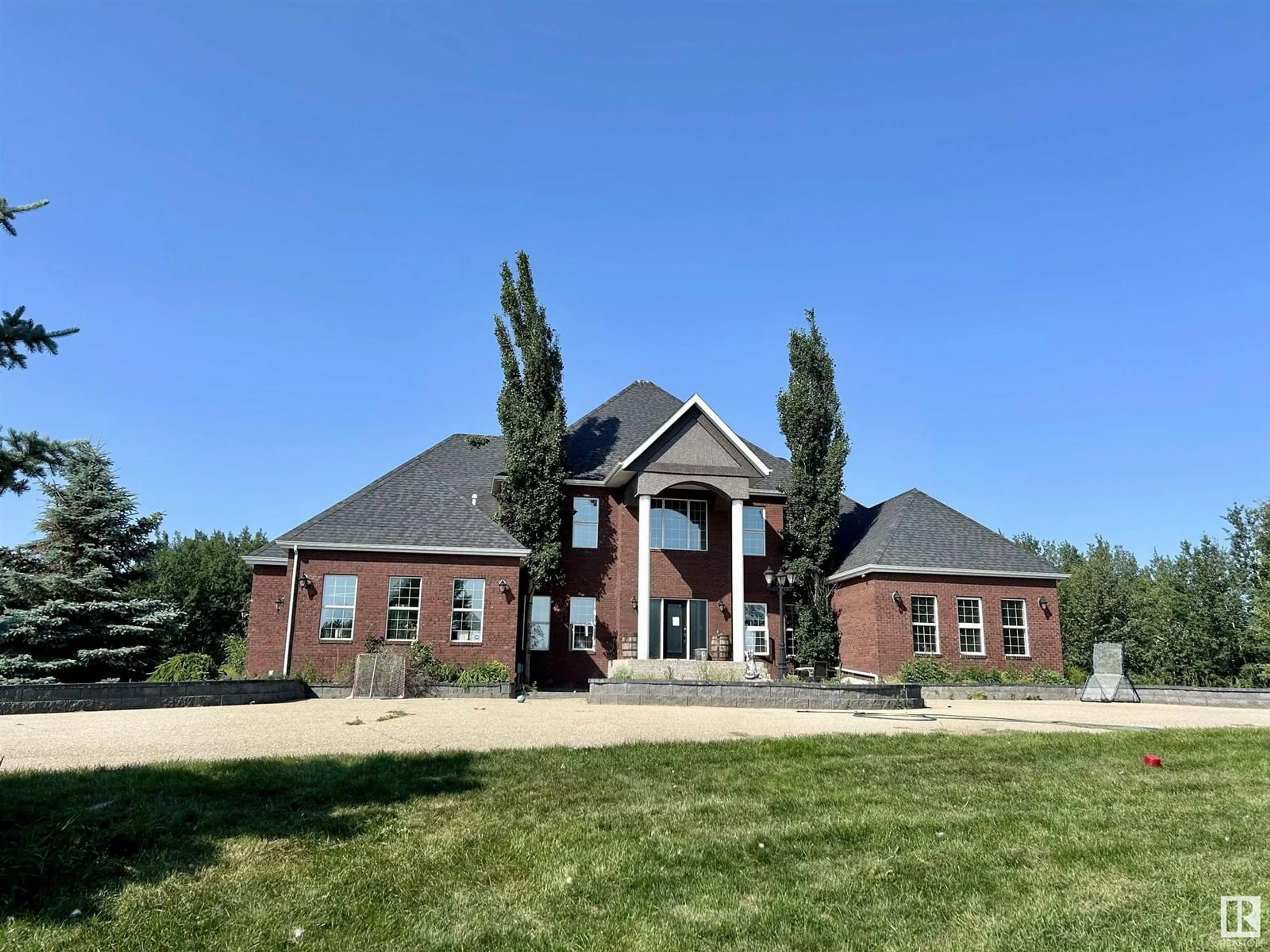 Frontside or backside of a home, the front or back of building for 99 26321 HGHWAY 627, Rural Parkland County Alberta T7Y1C7