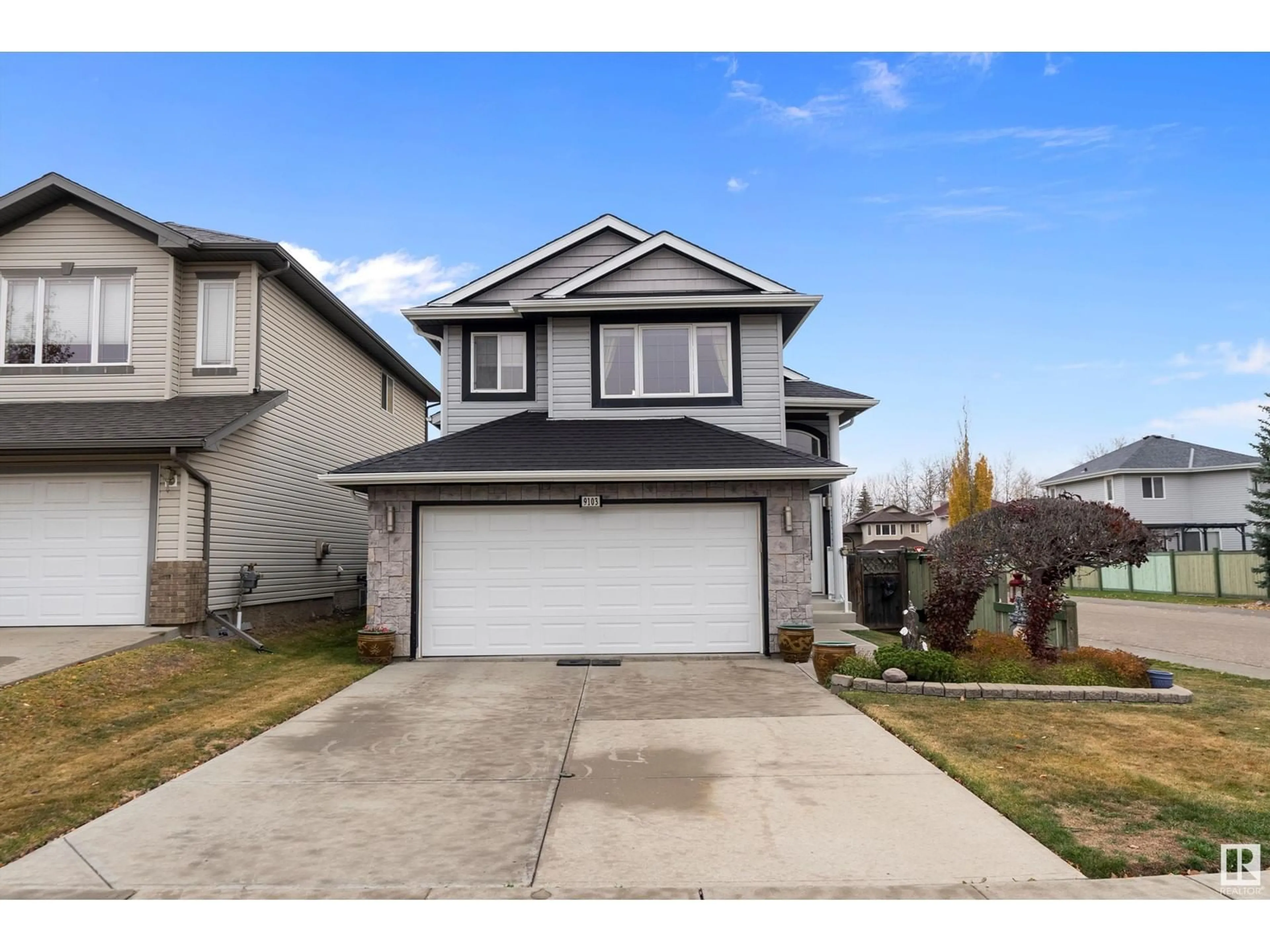 Frontside or backside of a home, the street view for 9103 206 ST NW, Edmonton Alberta T5T0W9