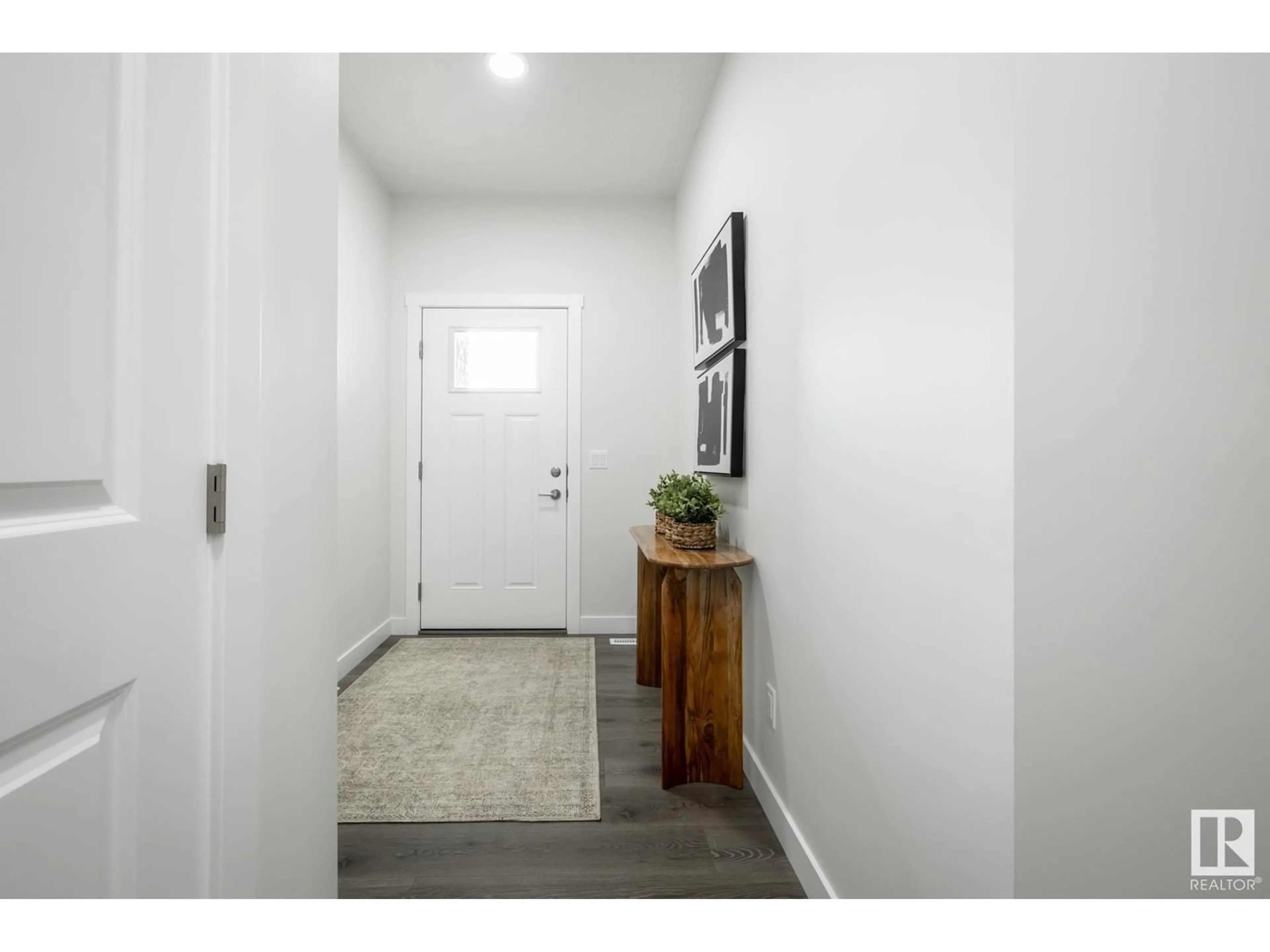 Indoor entryway, wood floors for 423 29 ST SW, Edmonton Alberta T6X3E7