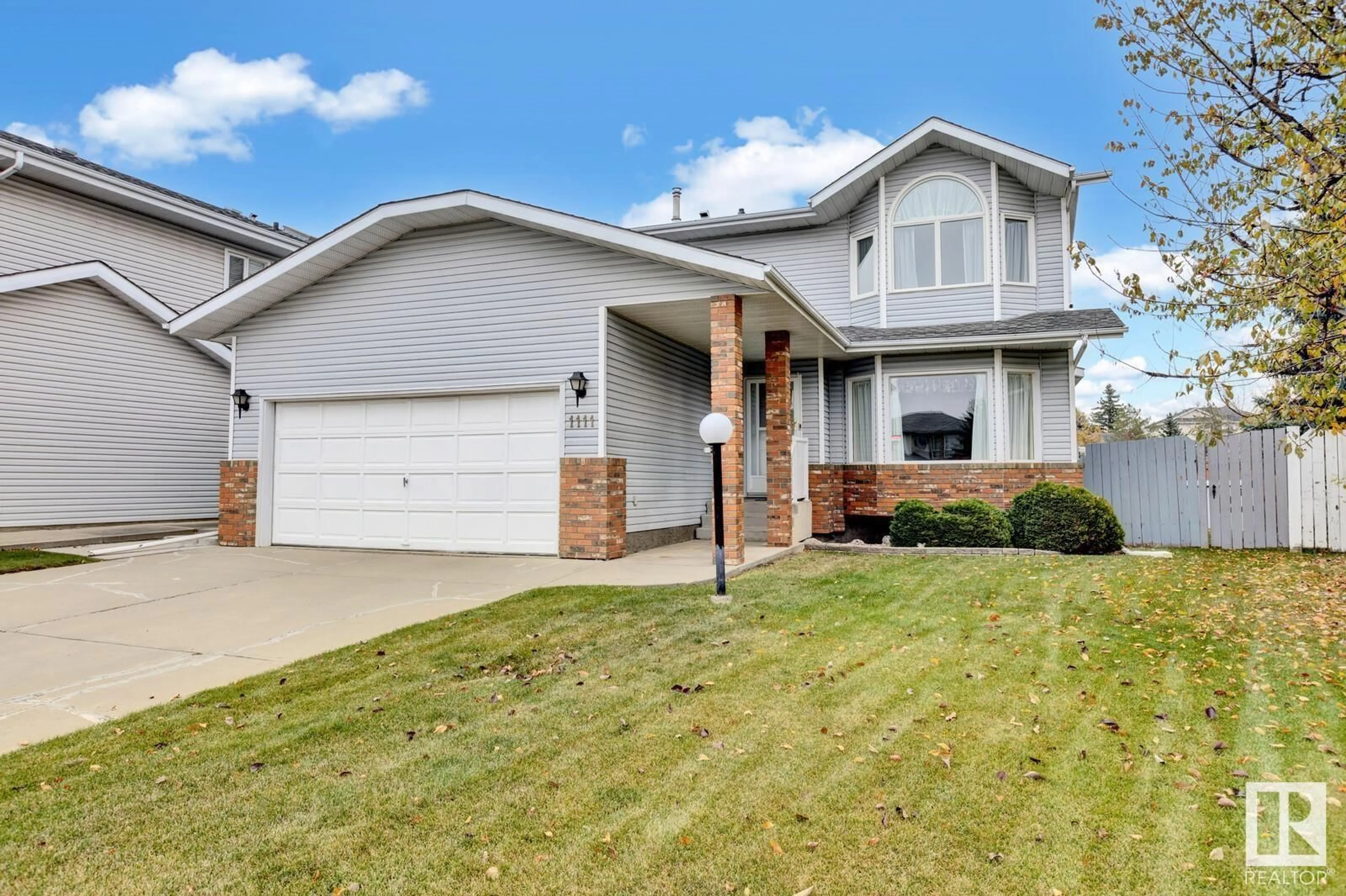 Frontside or backside of a home, the street view for 1111 111A ST NW, Edmonton Alberta T6J6R9