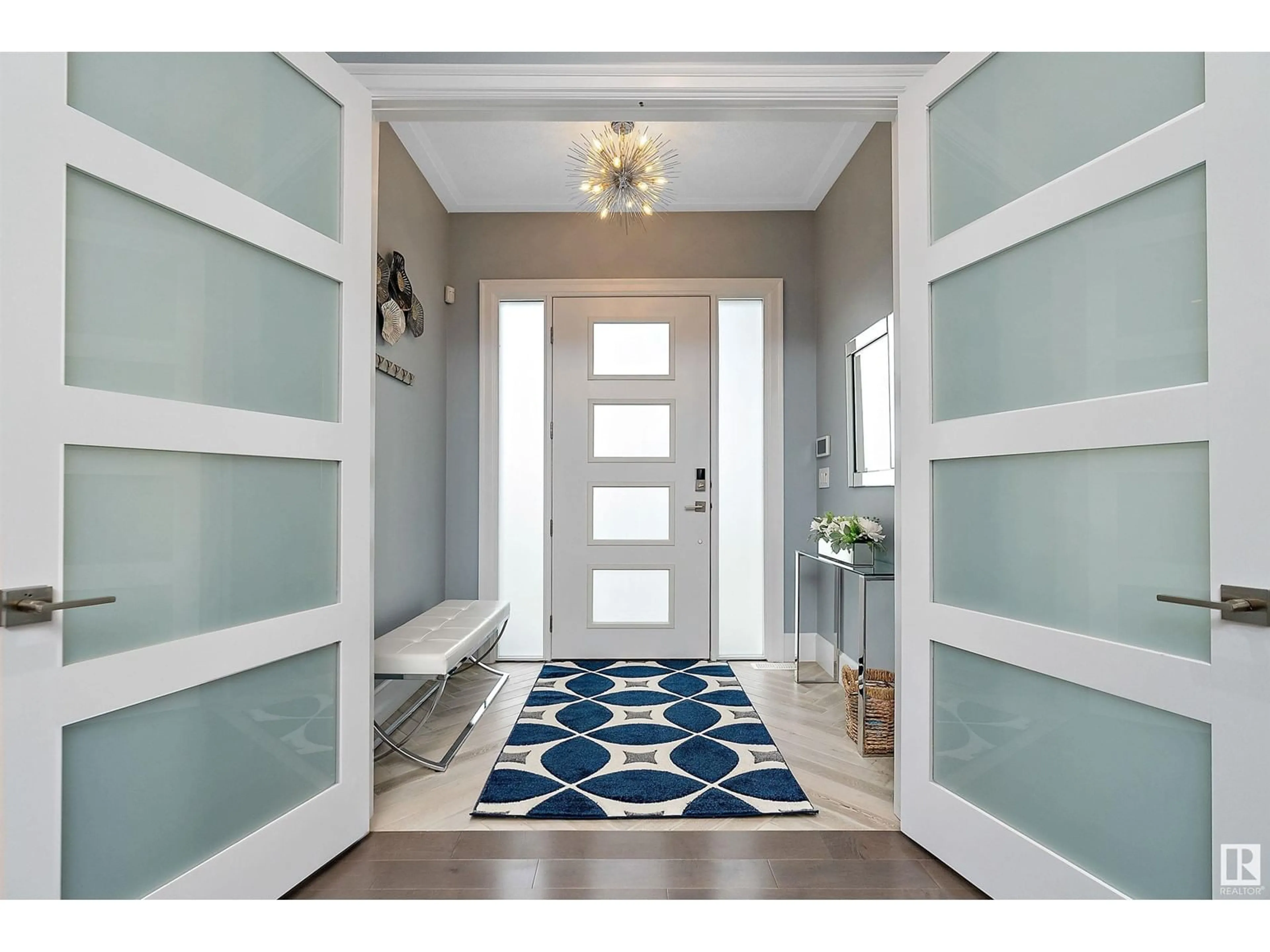 Indoor entryway, wood floors for 7706 JASPER AV NW, Edmonton Alberta T5H3R8