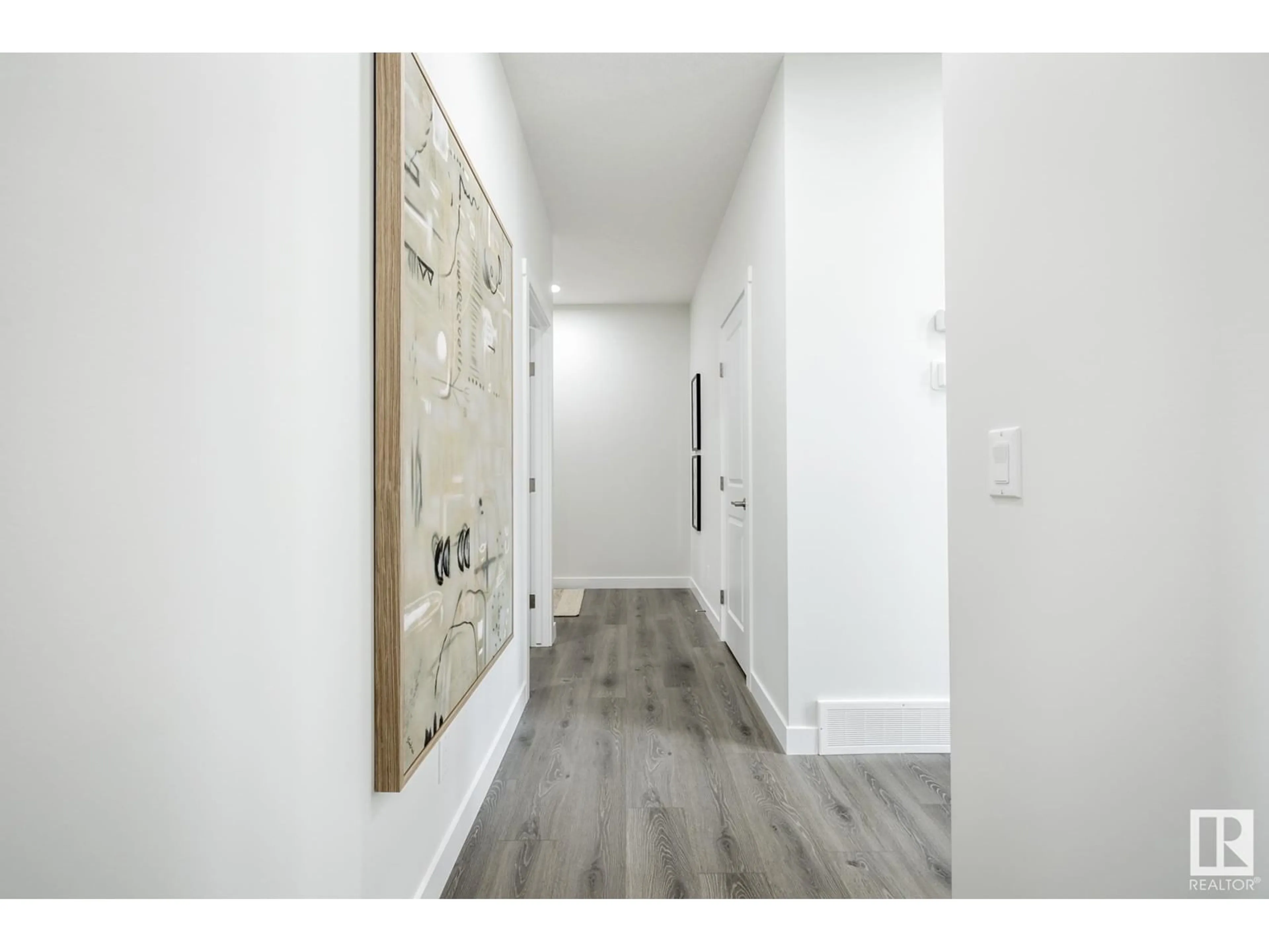 Indoor entryway, wood floors for 20956 22 AV NW, Edmonton Alberta T6M3C7