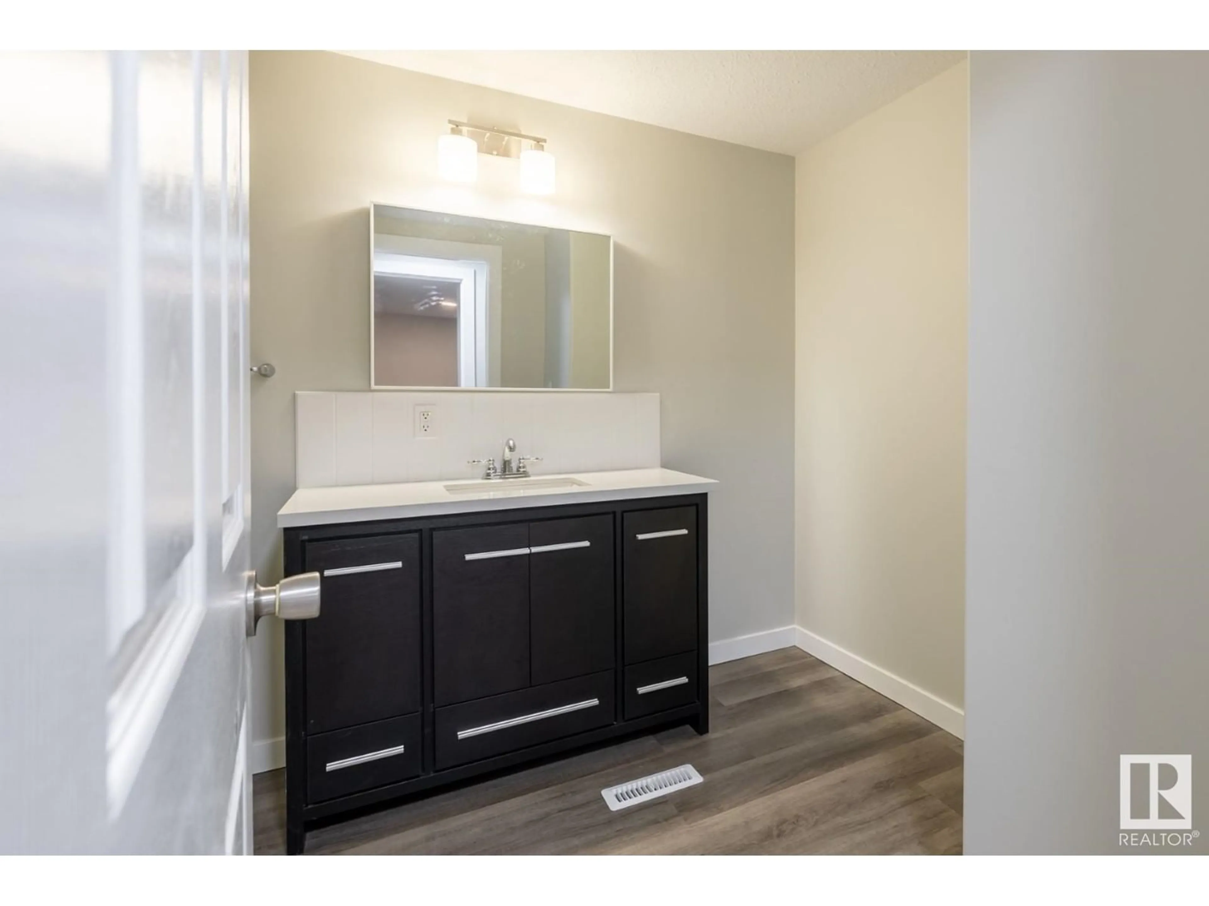 Standard bathroom, wood floors for 23 The Pkwy NW, Edmonton Alberta T6P1E1