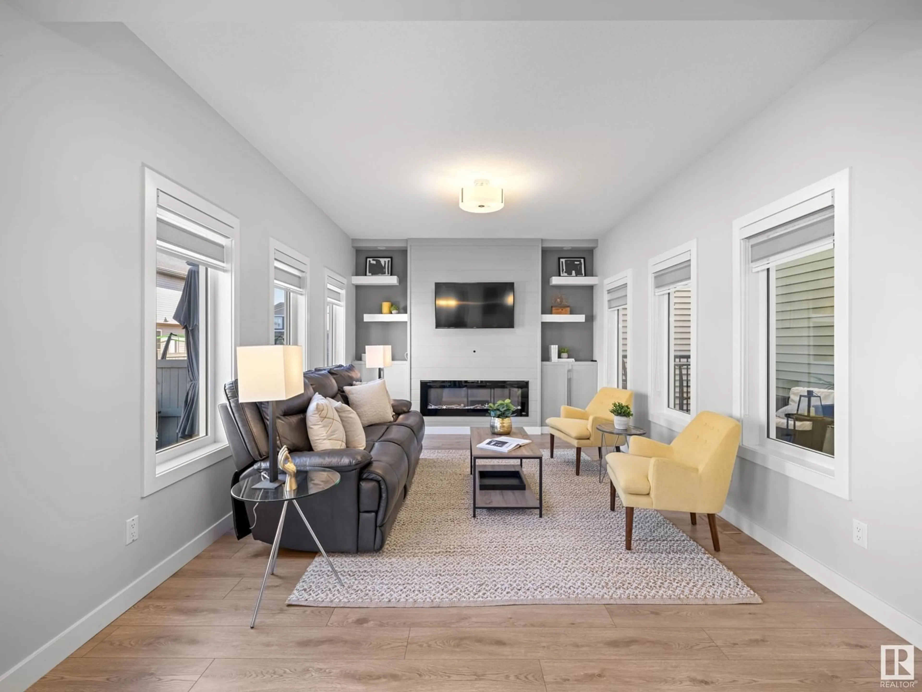 Living room, wood floors for 19620 26 AV NW, Edmonton Alberta T6M0X4