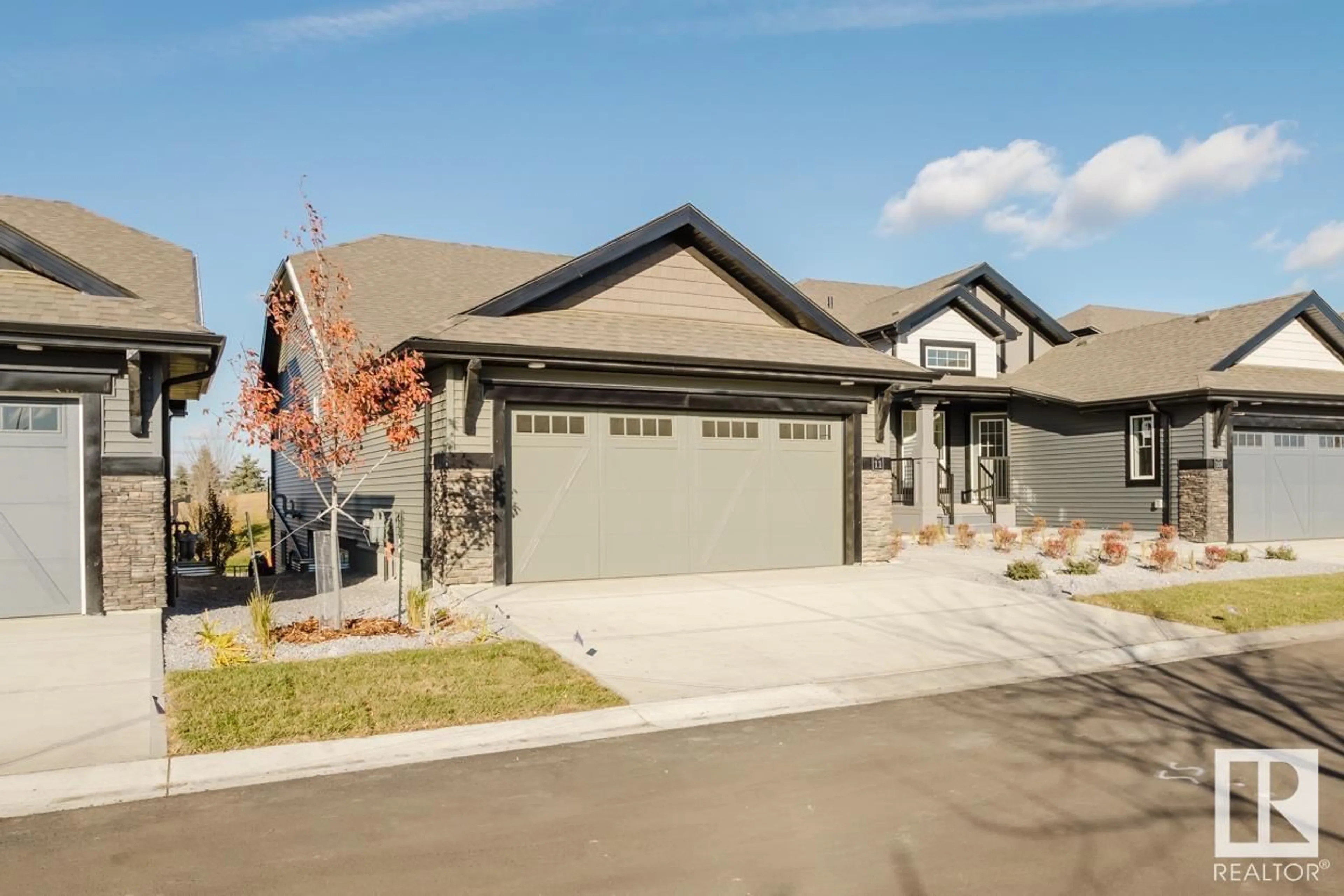 Frontside or backside of a home, the street view for #11 8050 ORCHARDS GREEN GR SW, Edmonton Alberta T6X2N2