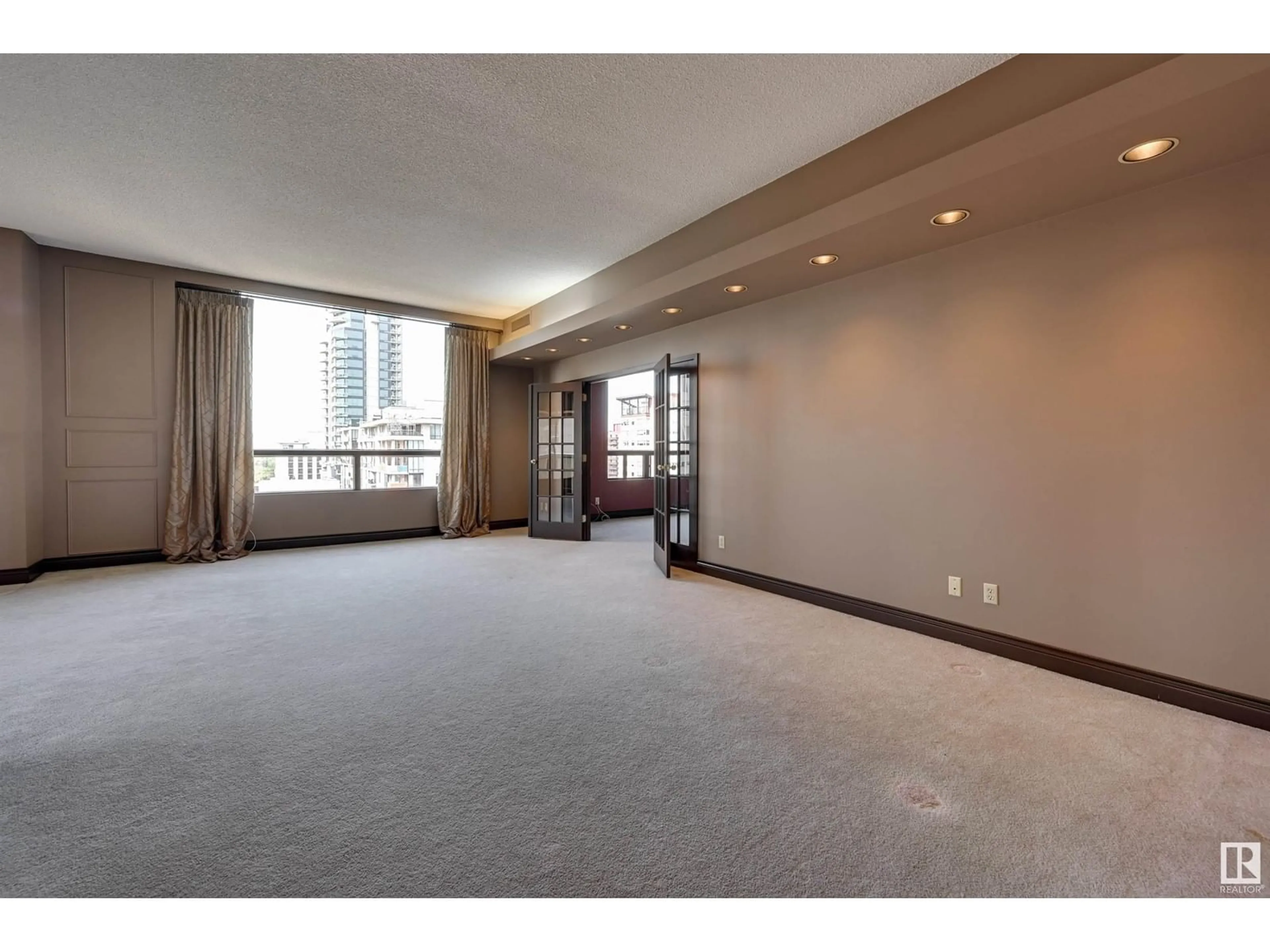 A pic of a room, carpet floors for #12A 10050 118 ST NW, Edmonton Alberta T5K2M8