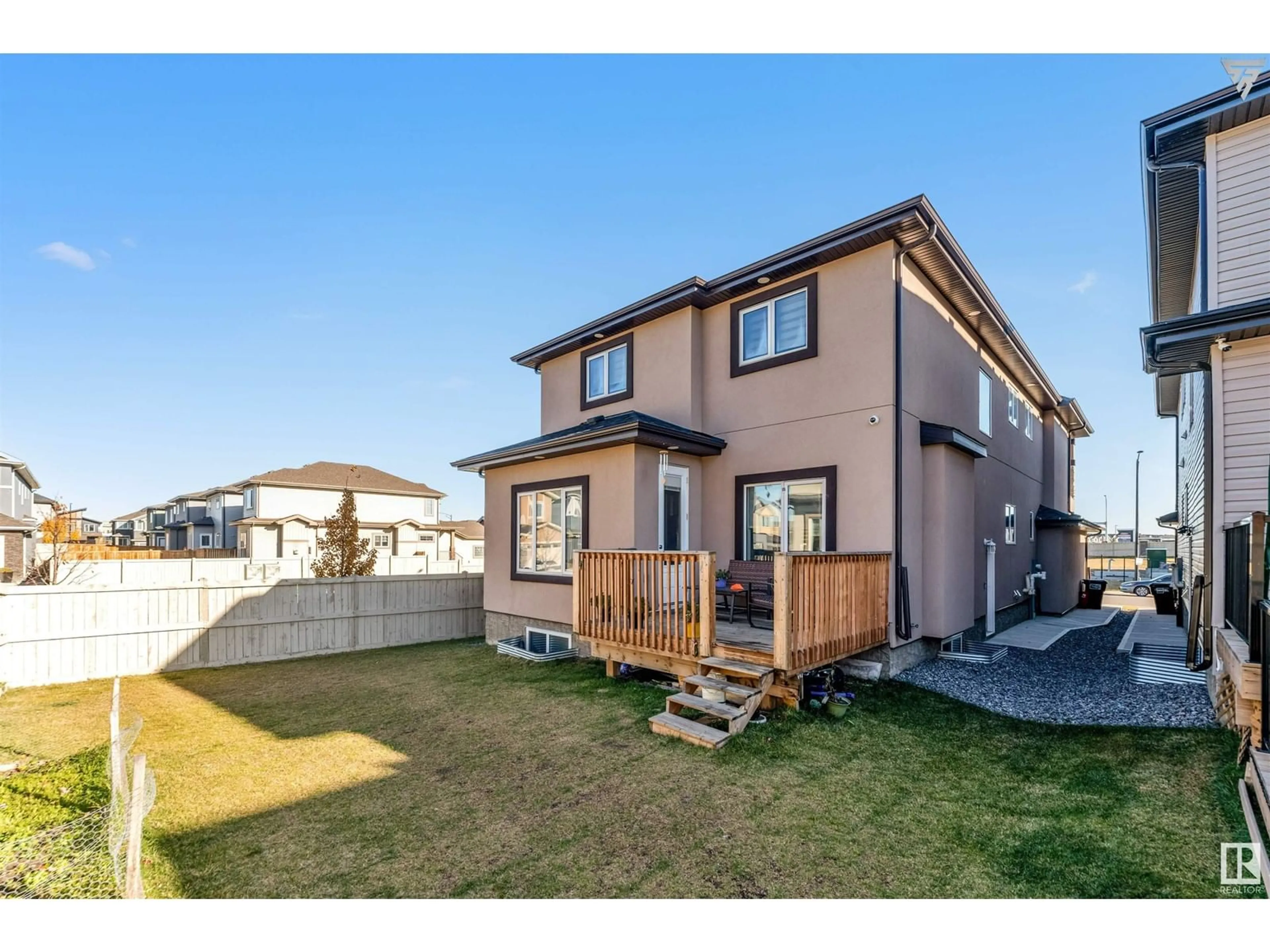 Frontside or backside of a home, the fenced backyard for 1868 18 ST NW, Edmonton Alberta T6T1J1