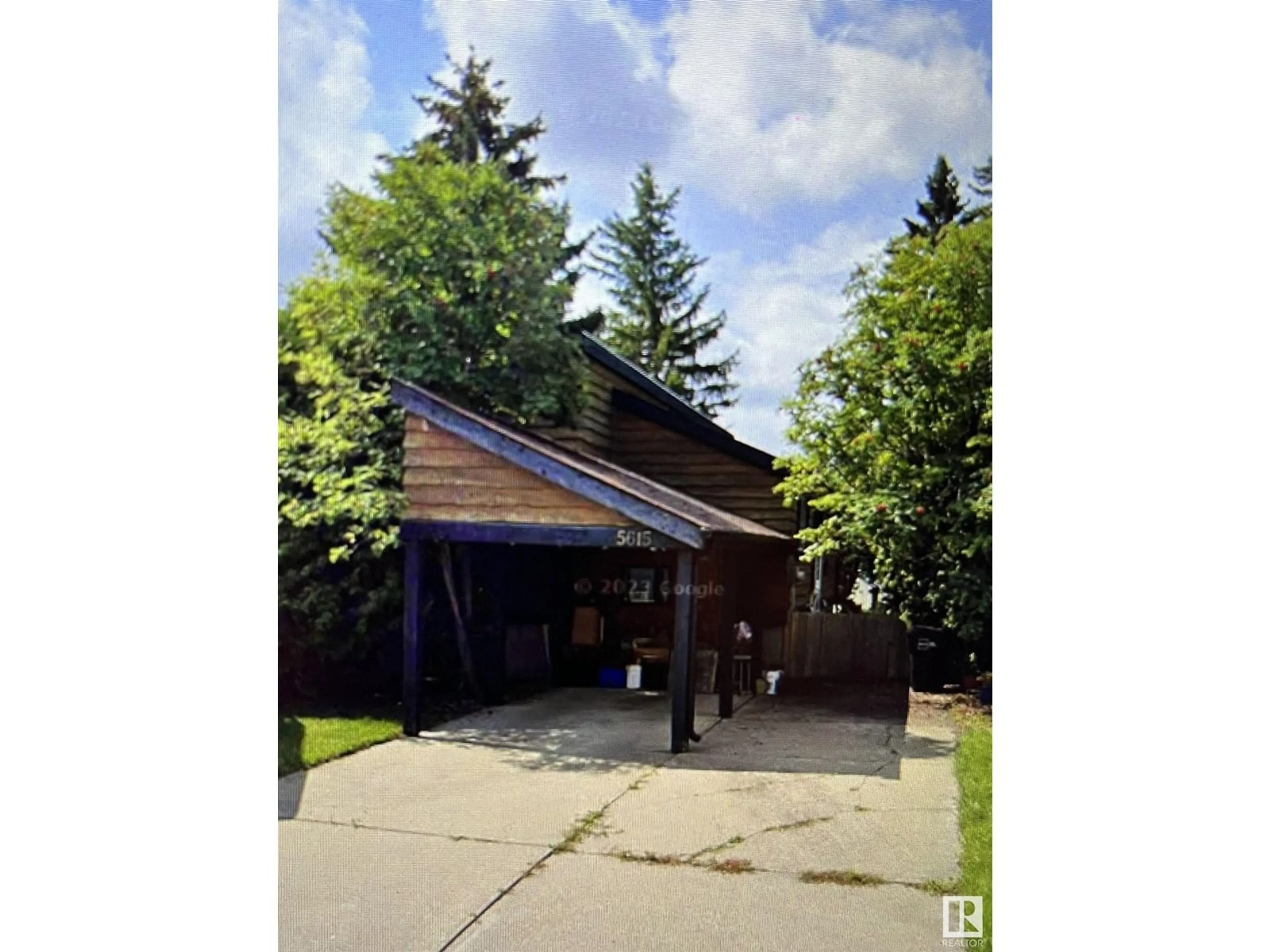 Frontside or backside of a home, the front or back of building for 5615 92C AV NW, Edmonton Alberta T6B2K9