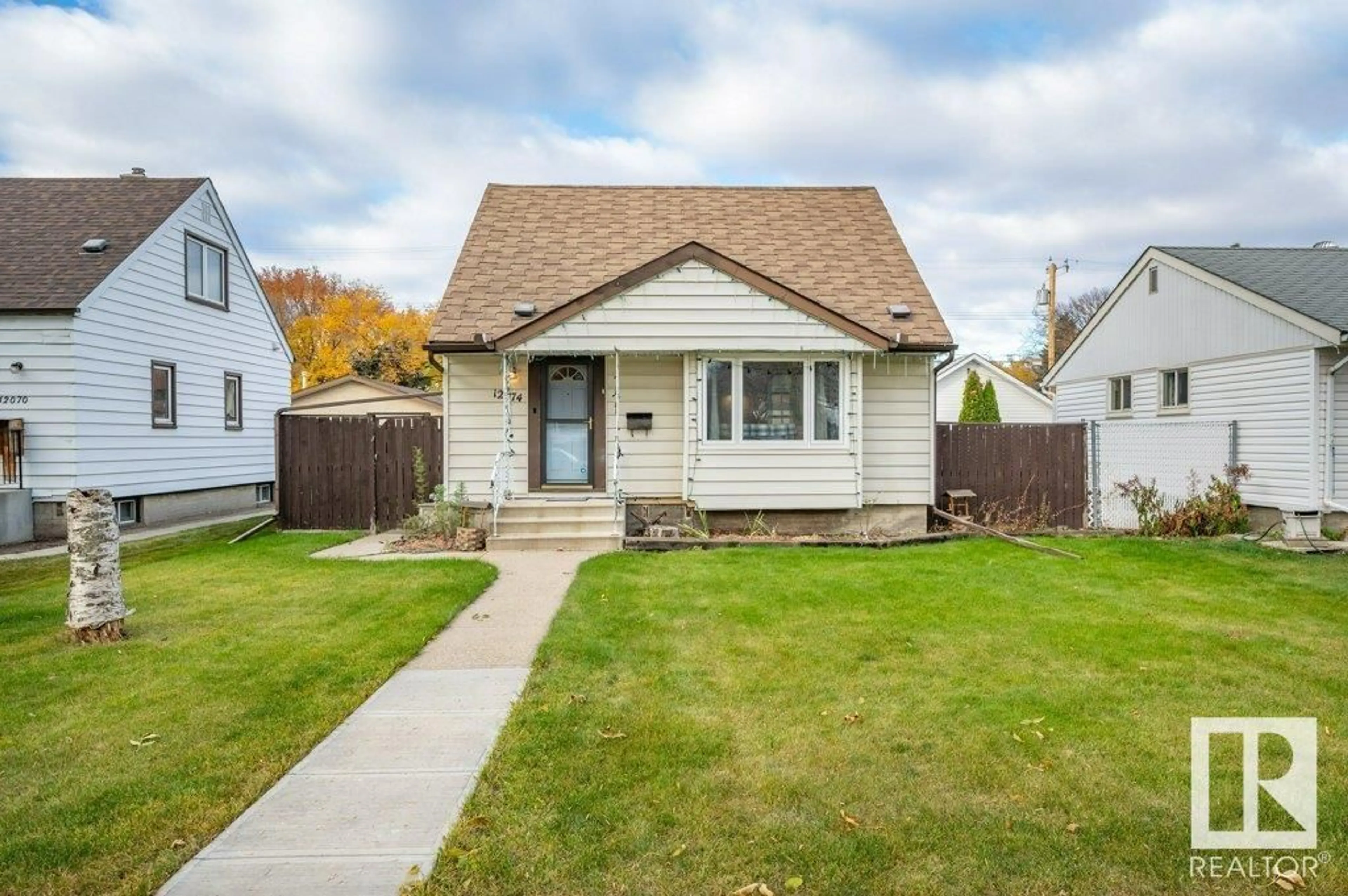 Frontside or backside of a home, cottage for 12074 58 ST NW, Edmonton Alberta T5W3X3