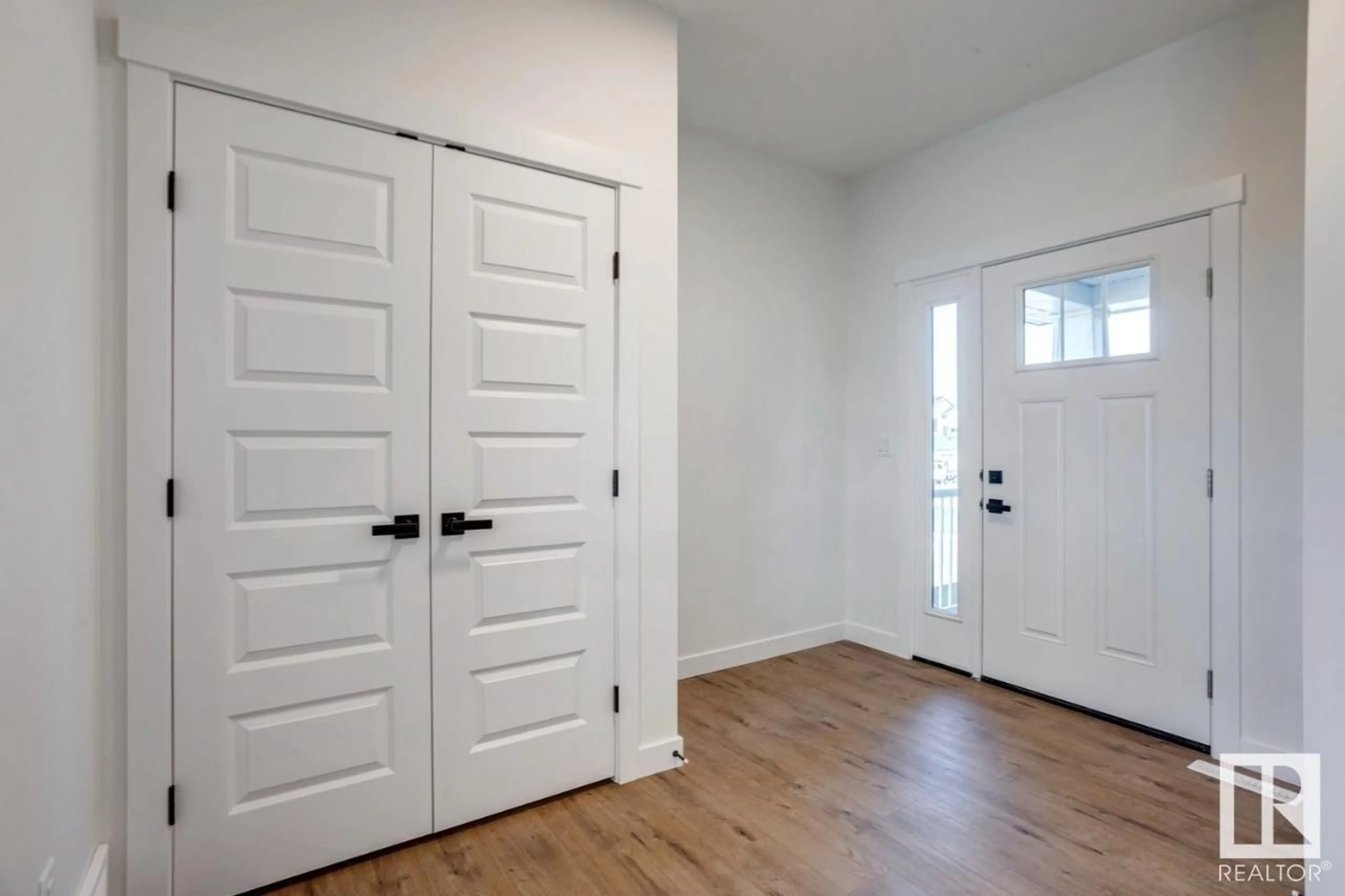 Indoor entryway, wood floors for 1552 HOWES PL SW, Edmonton Alberta T6W5C1