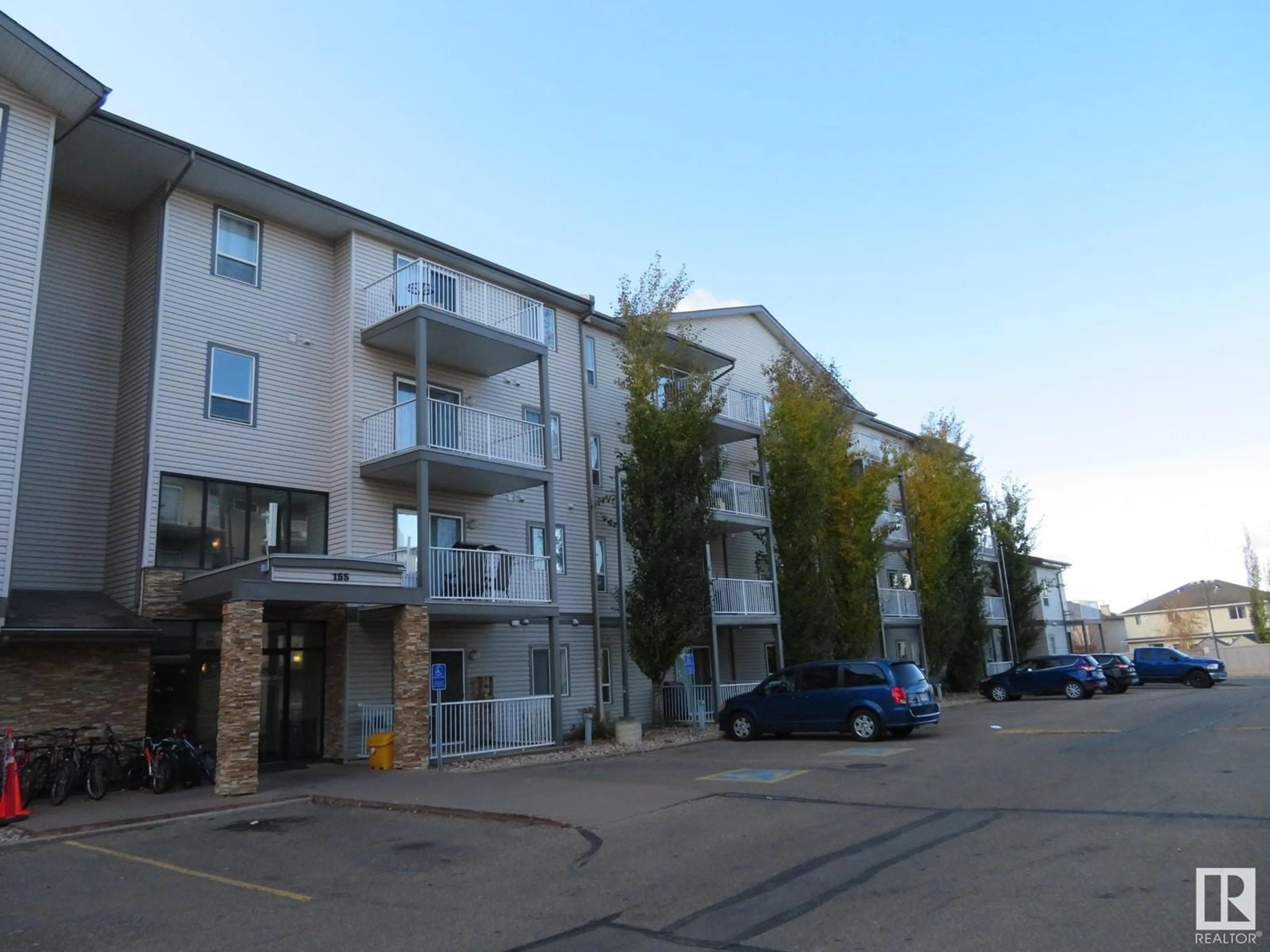 A pic from exterior of the house or condo, the street view for #117 155 EDWARDS DR SW, Edmonton Alberta T6X1N6