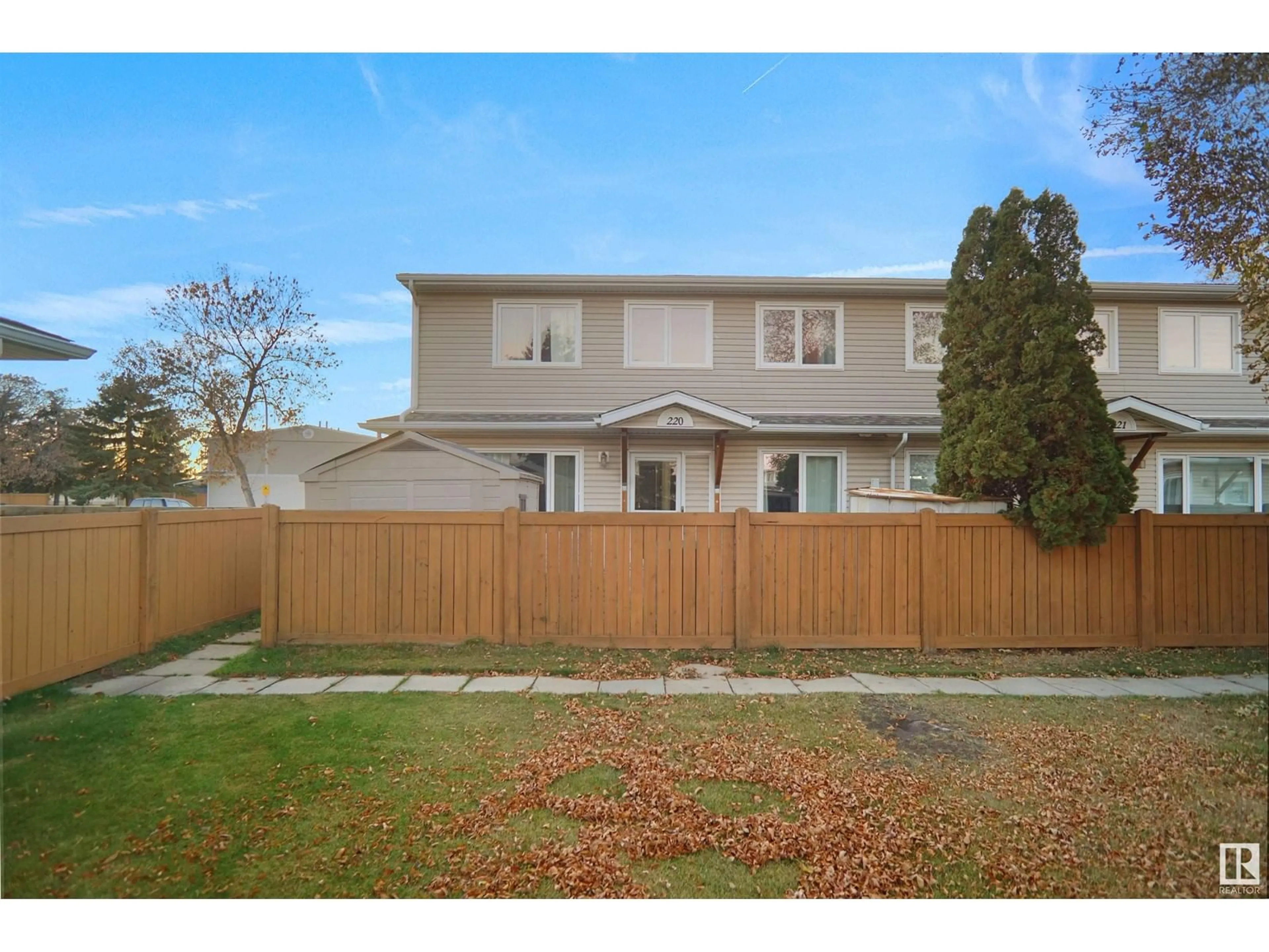 Frontside or backside of a home, the fenced backyard for 220 TELFORD CO, Leduc Alberta T9E5M6