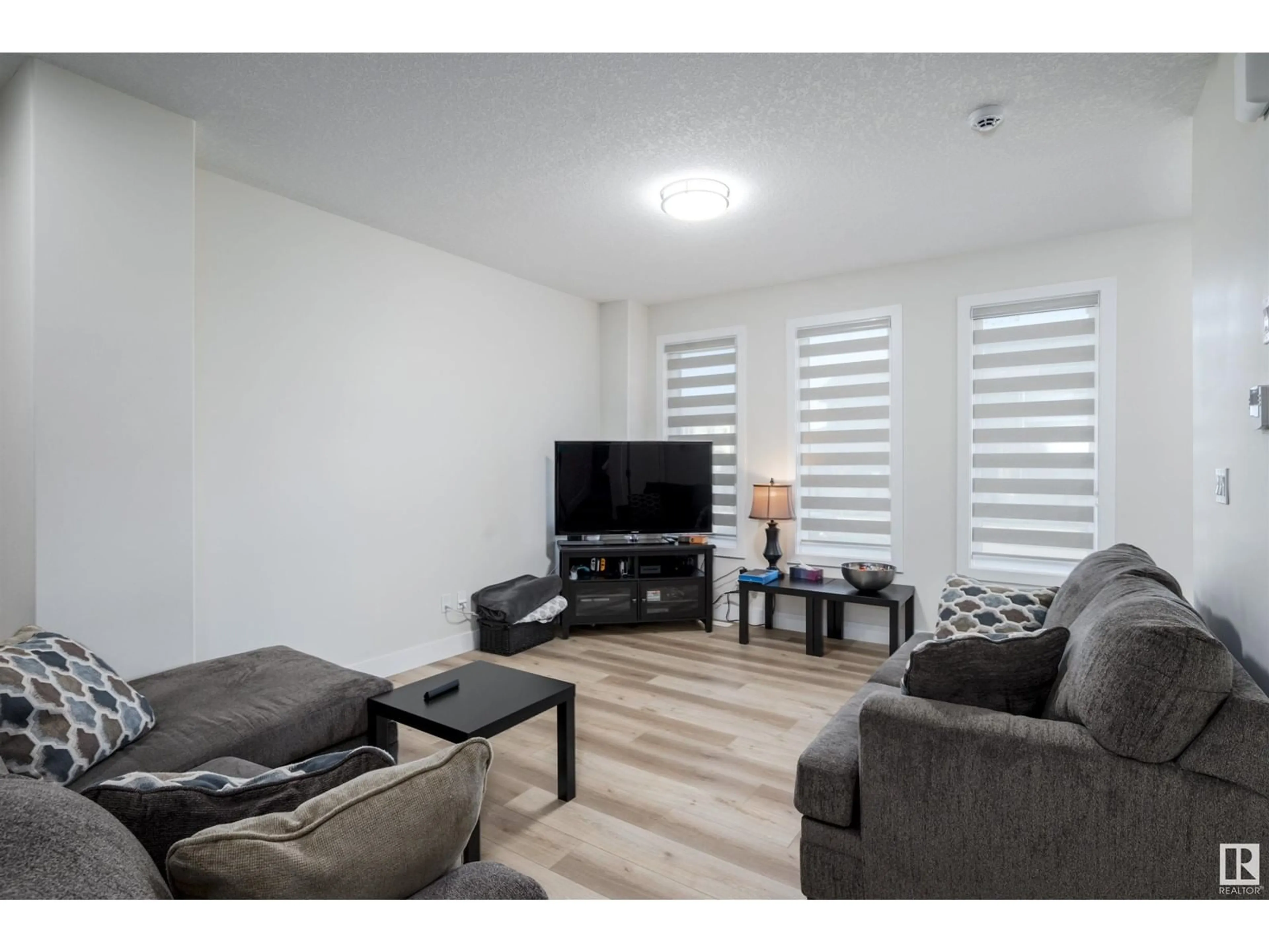 Living room, wood floors for 188 Caledonia DR N, Leduc Alberta T9E0S9