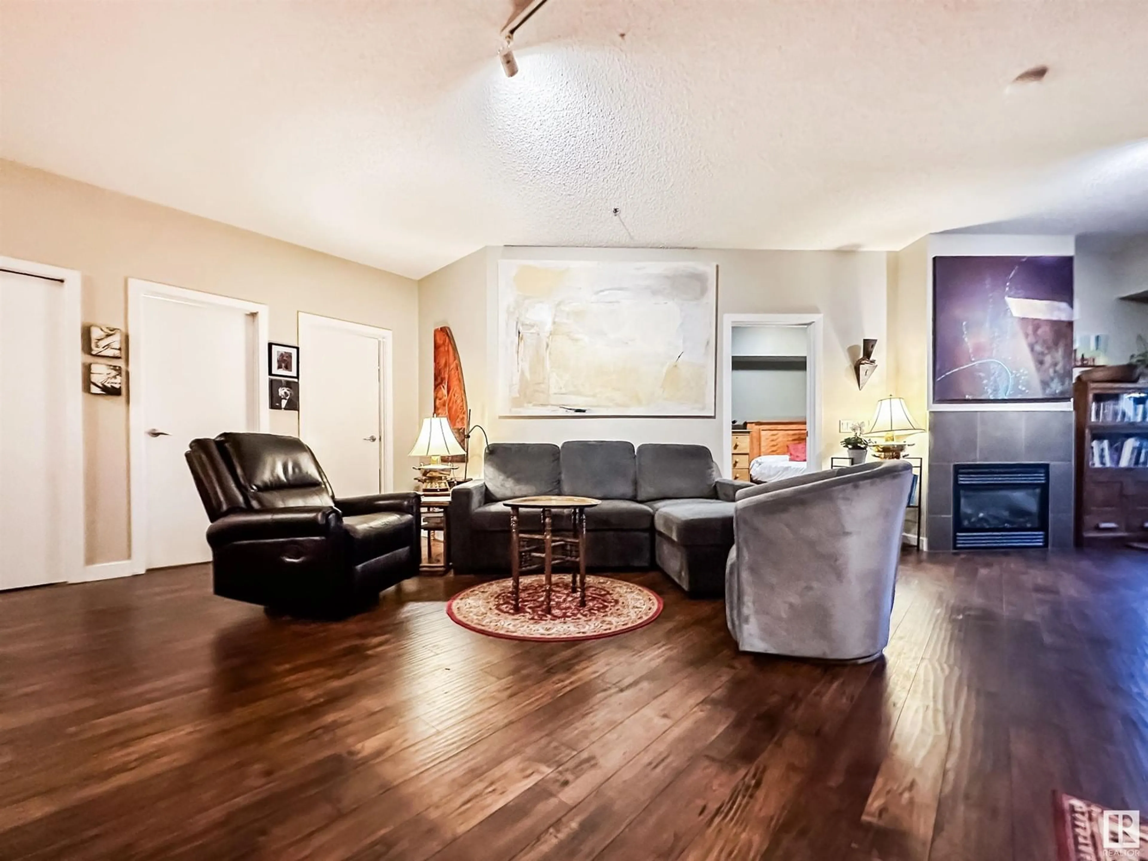 Living room, wood floors for #210 9750 94 ST NW, Edmonton Alberta T6C2E3