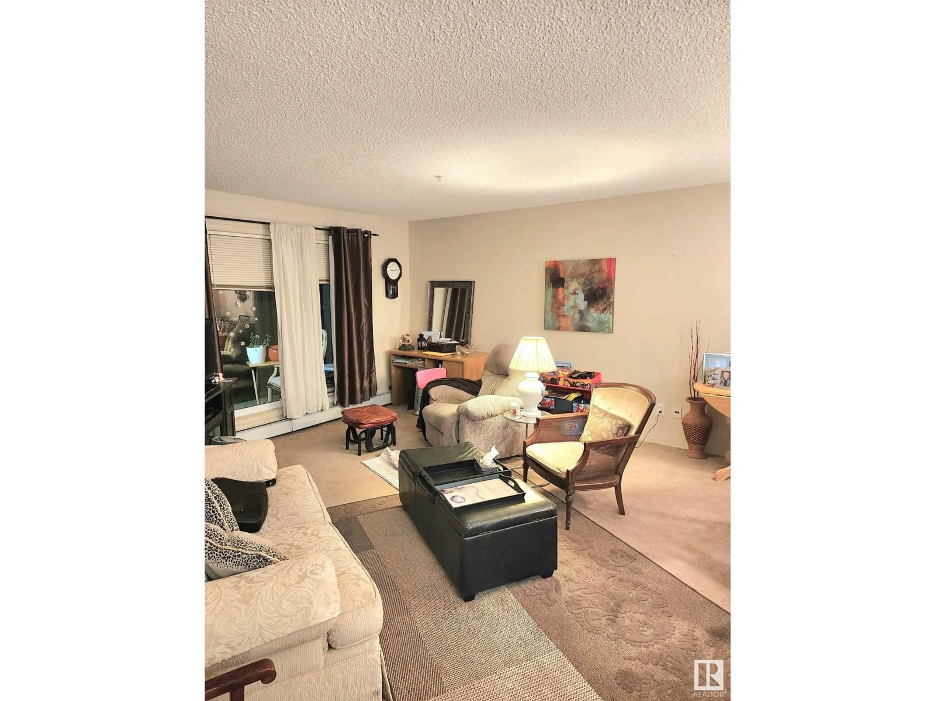 Living room, carpet floors for #138 1180 HYNDMAN RD NW, Edmonton Alberta T5A0P8