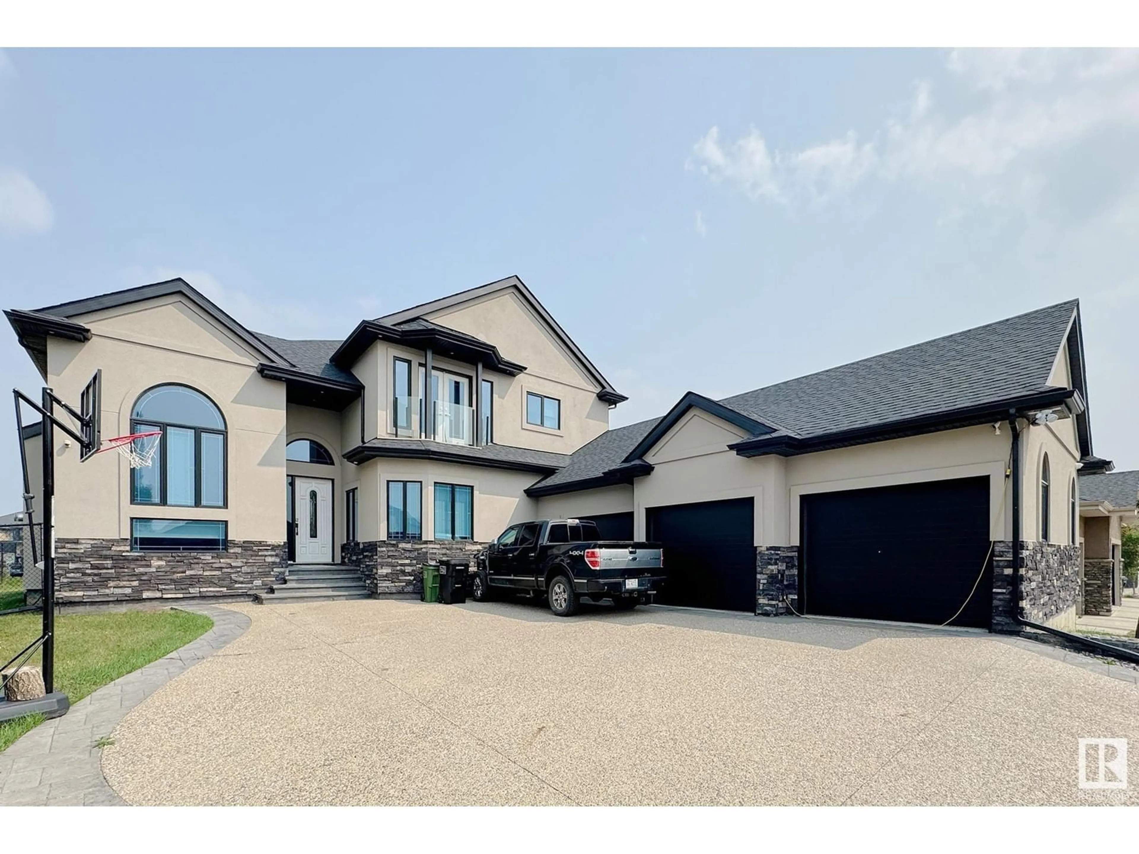 Frontside or backside of a home, the street view for 16611 9 St NE, Edmonton Alberta T5Y0P6